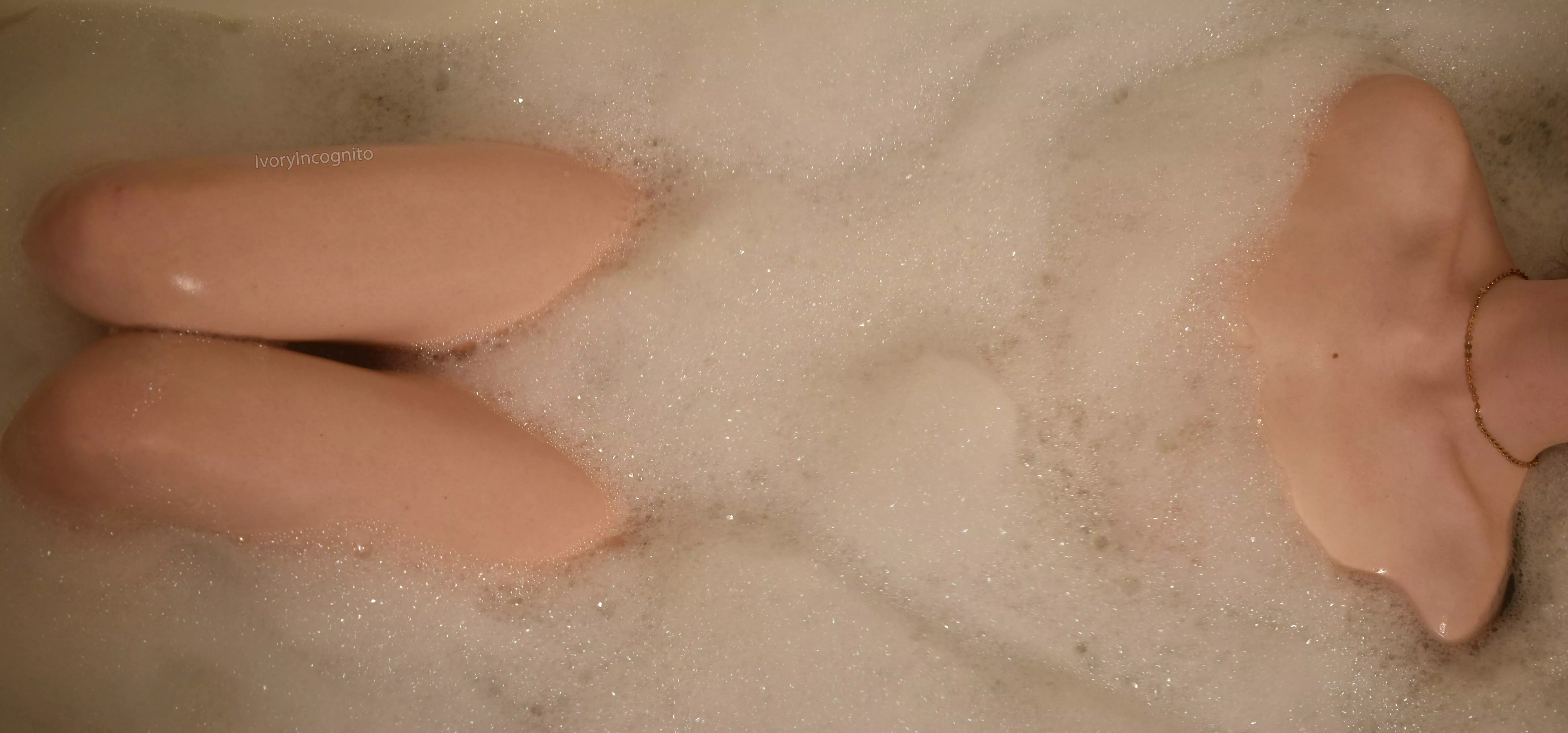 collarbones in a bubble bath