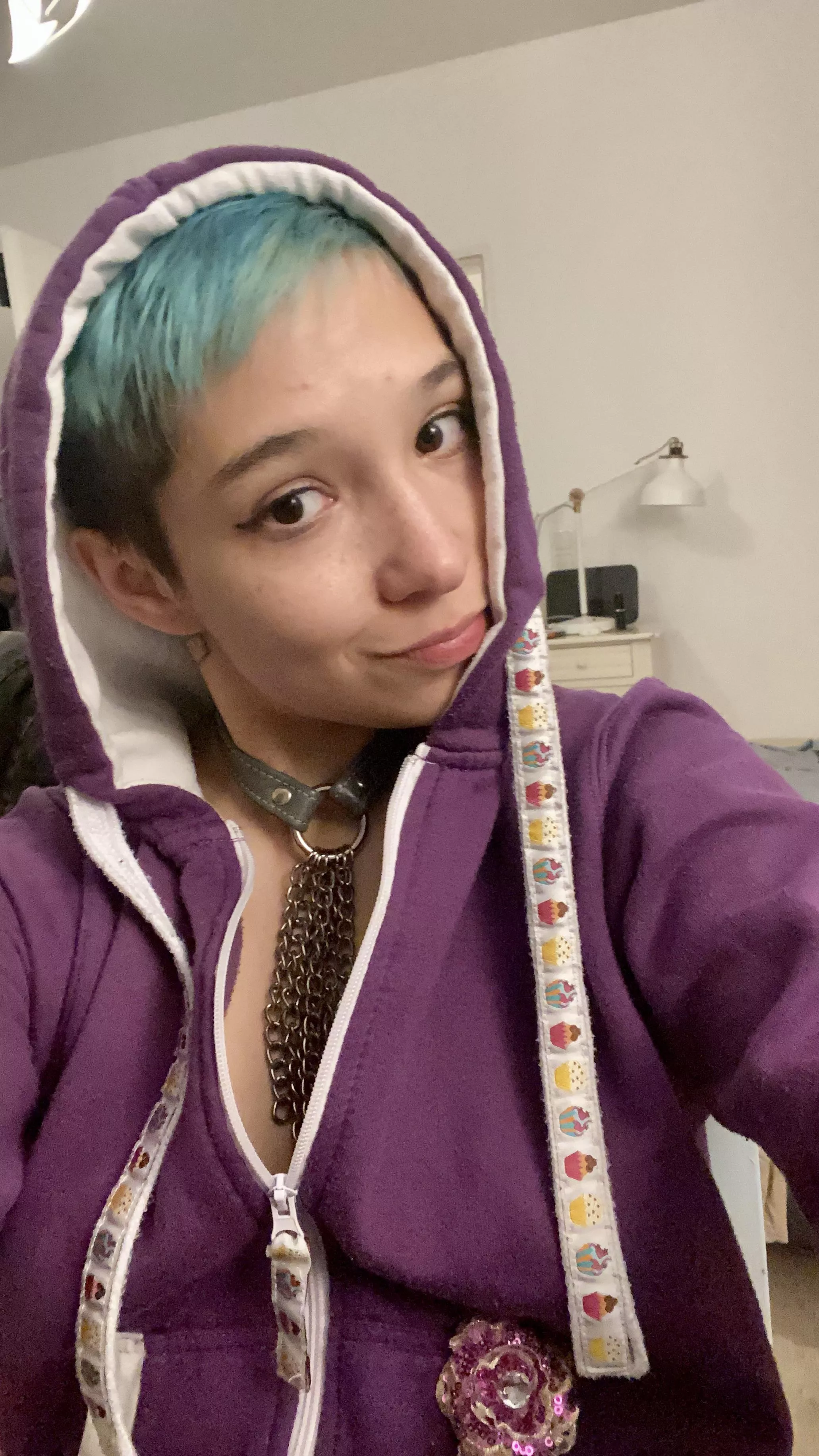 Comfy in my onesie and collar! 💜⛓