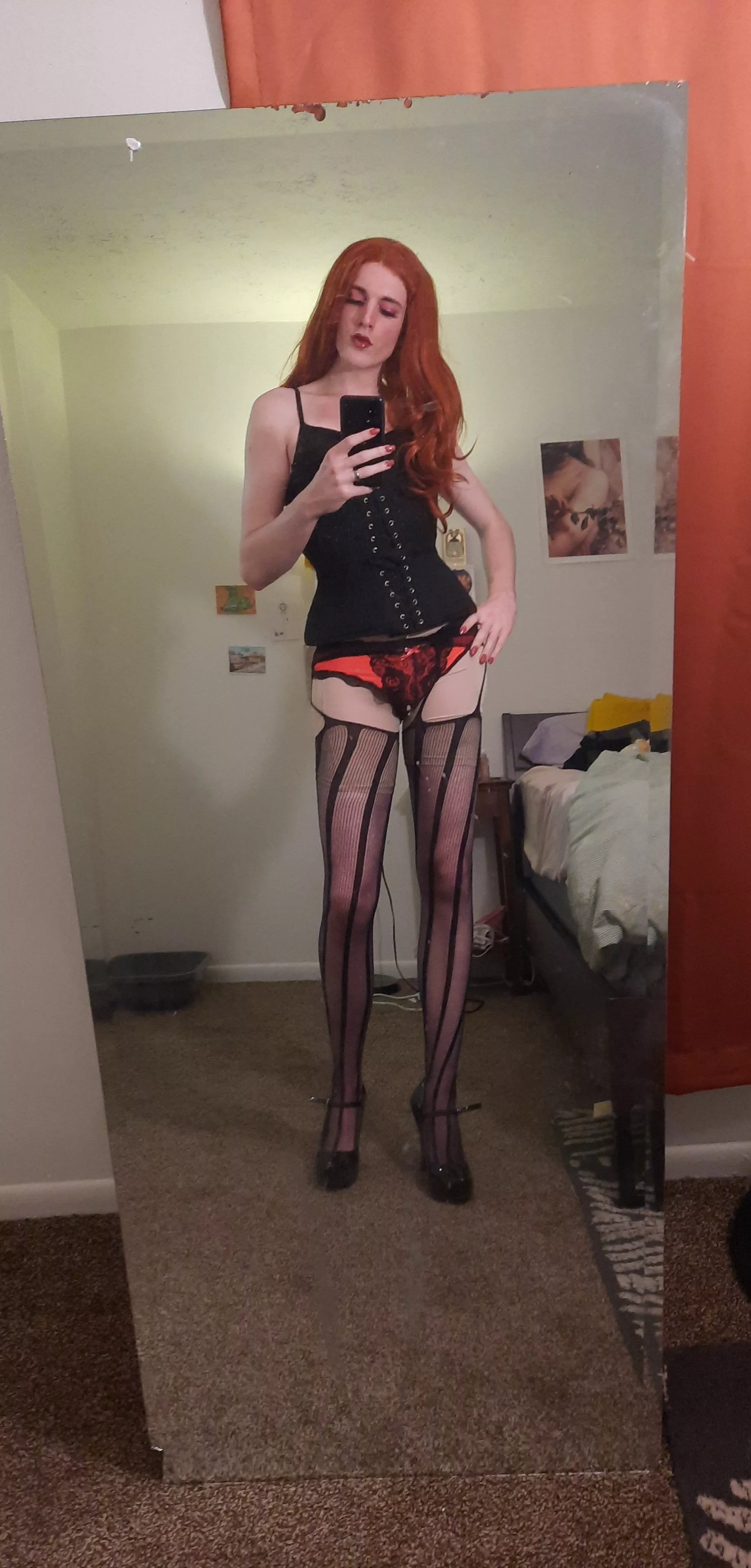 Corset and a thong makes for a cute combo