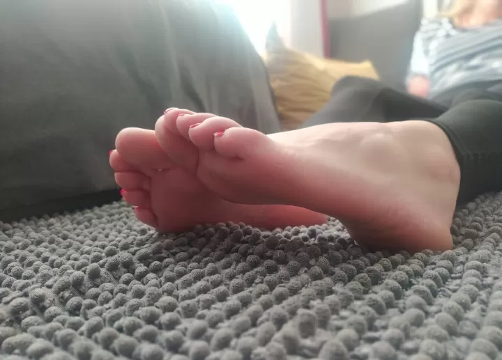 Could you establish and maintain eye contact with me while licking my feet? 👀