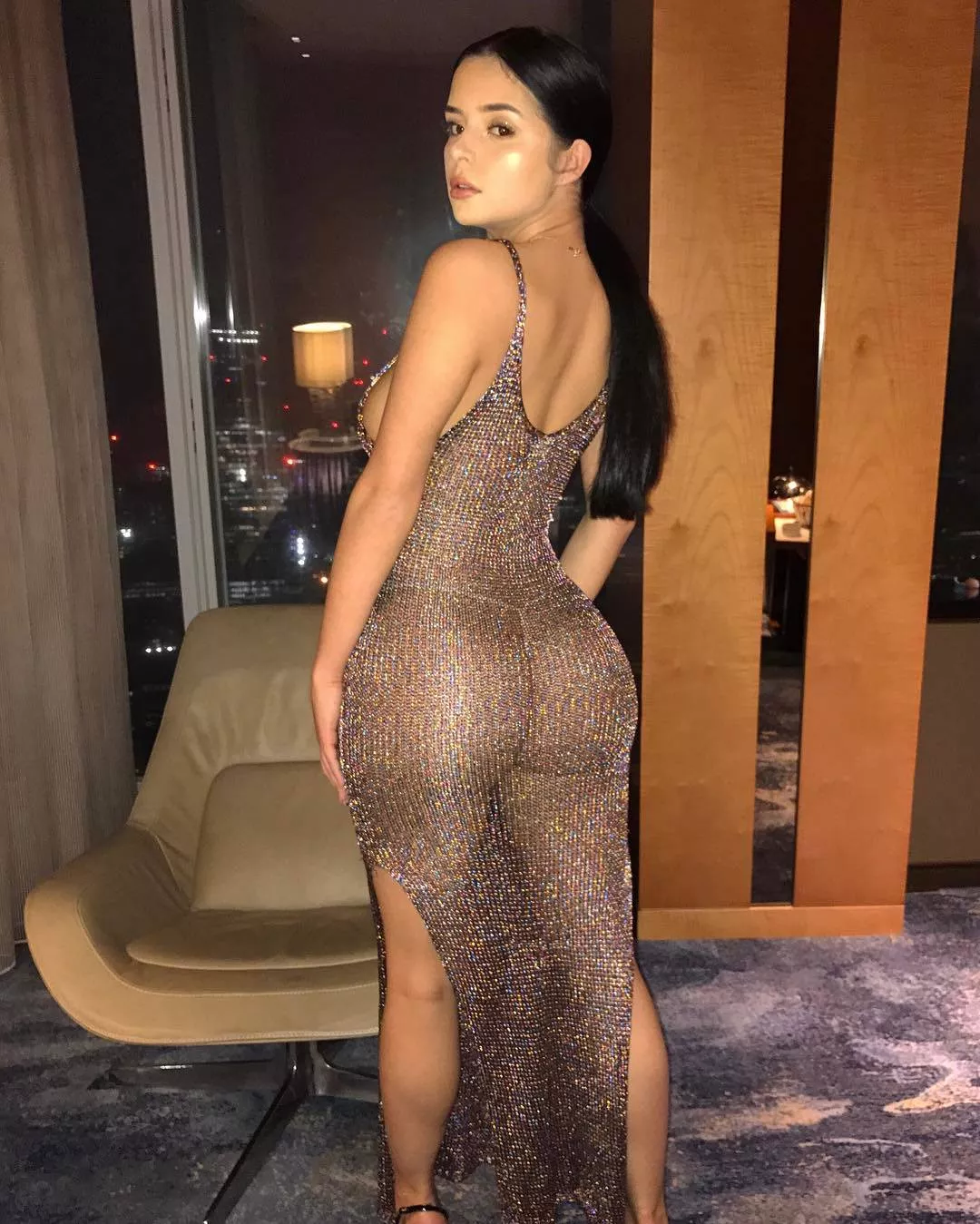 Demi Rose showing off her ass in metallic dress