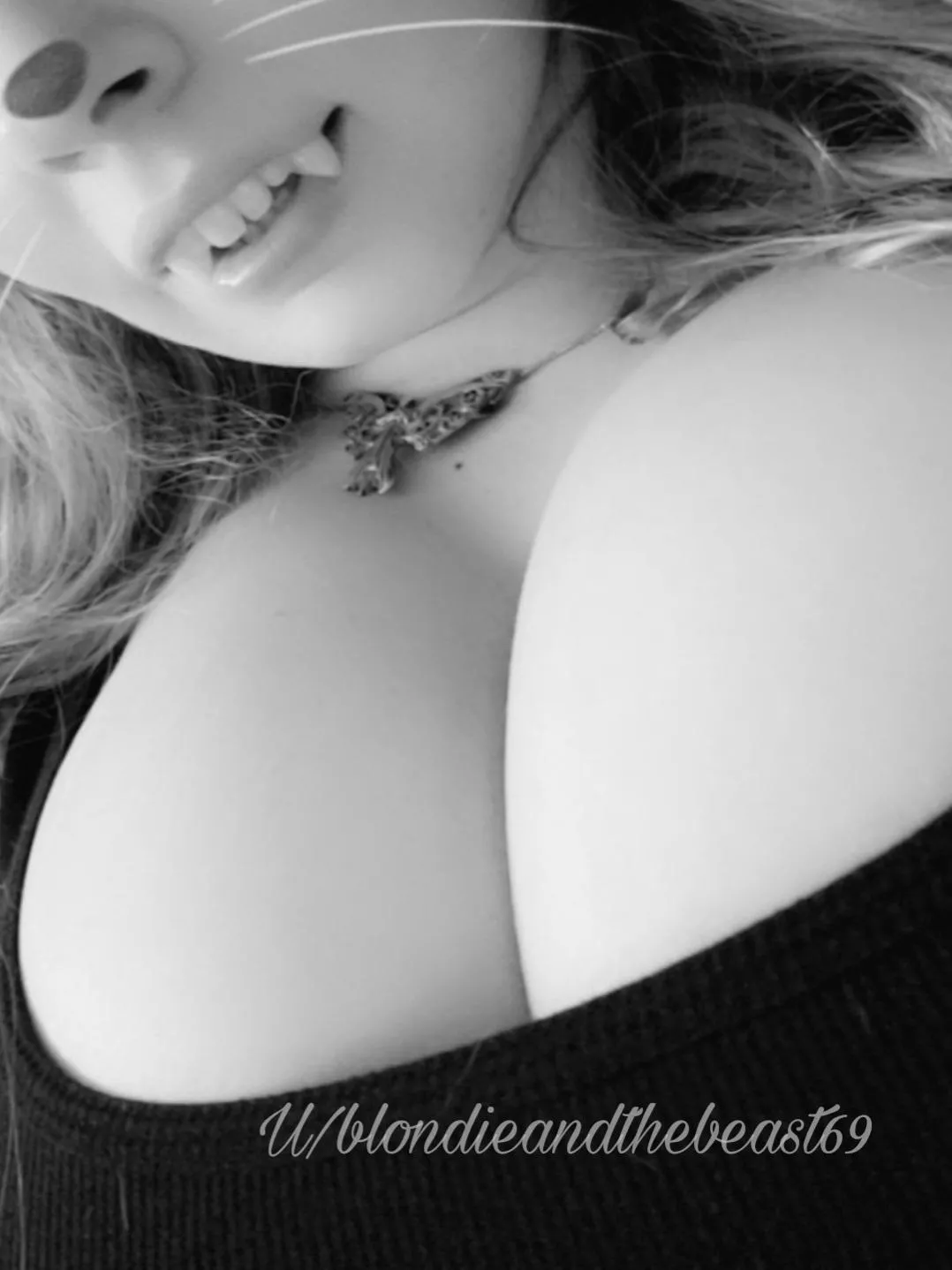 Do these fangs make my boobs look big?