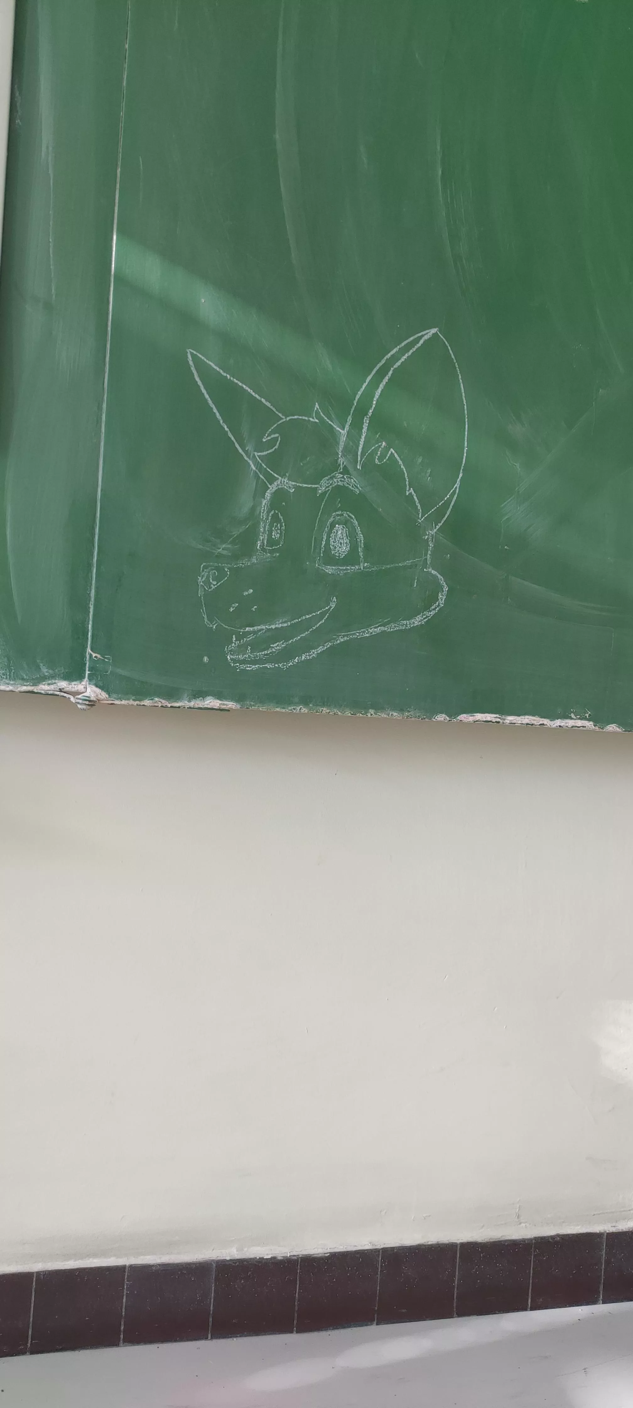 Drew this little doodle on the school board while waiting for my dad to come pick me up