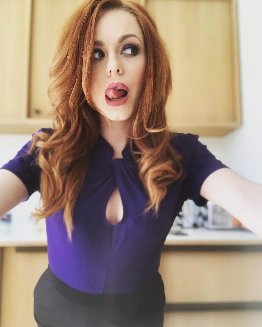 Ella Hughes licking her lips