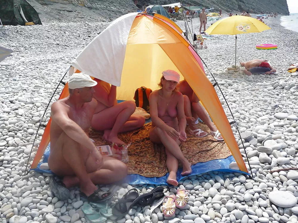 Family camping on the nude beach