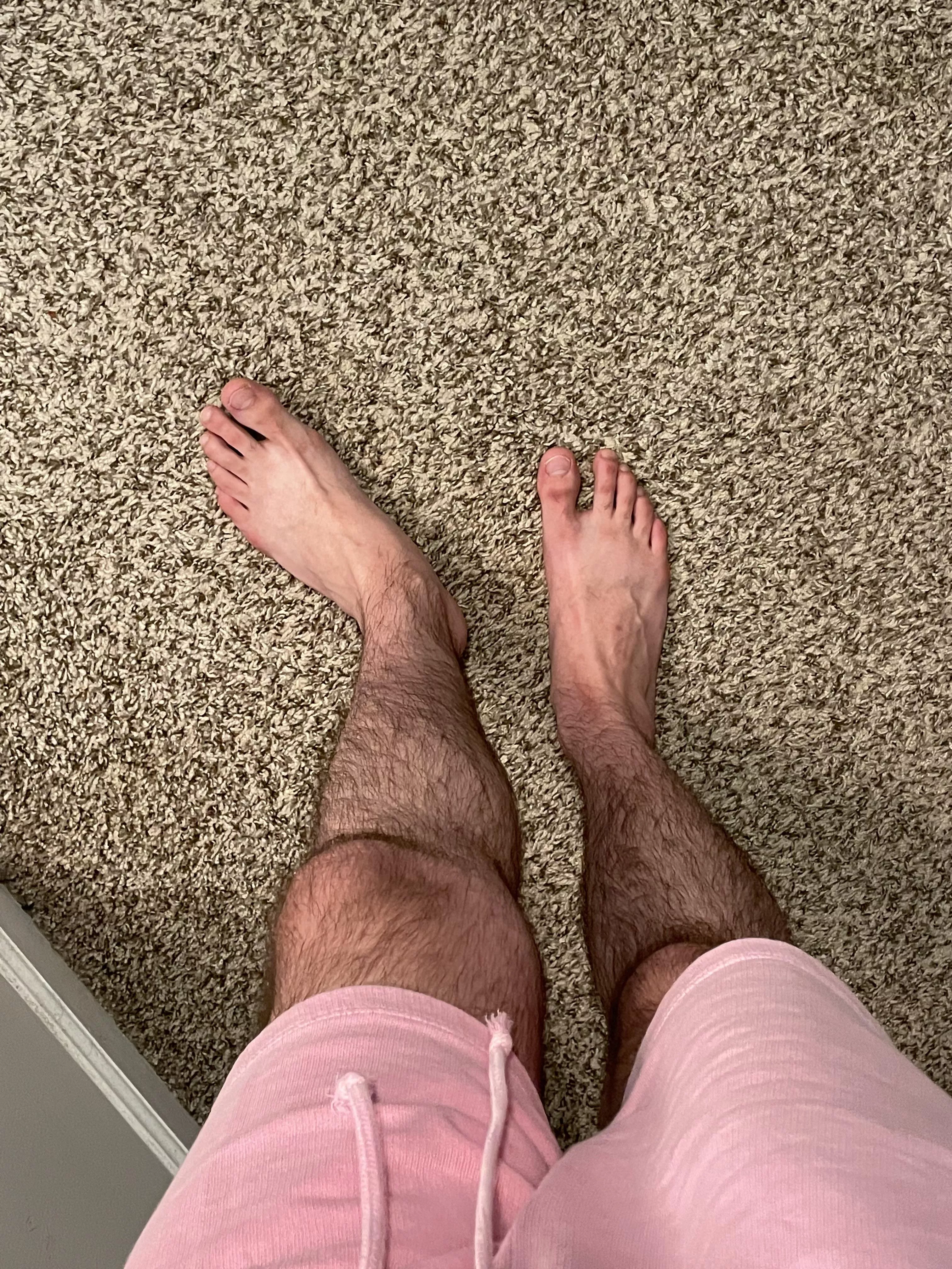 Feet and hairy legs