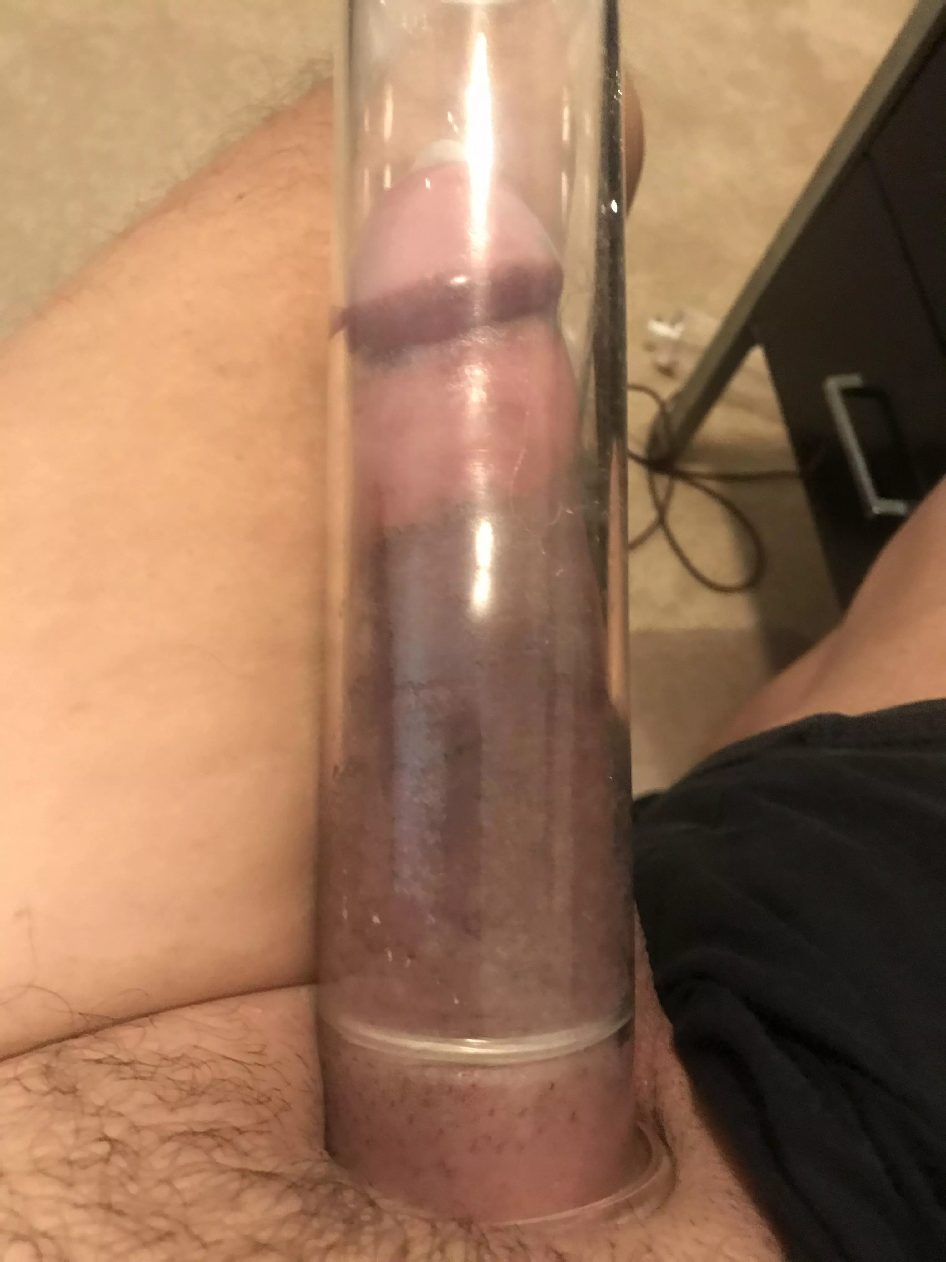 First time pumping with a condom. Shame that XL condoms are not longer and wider. This one left a deep purple line at the base of my shaft.