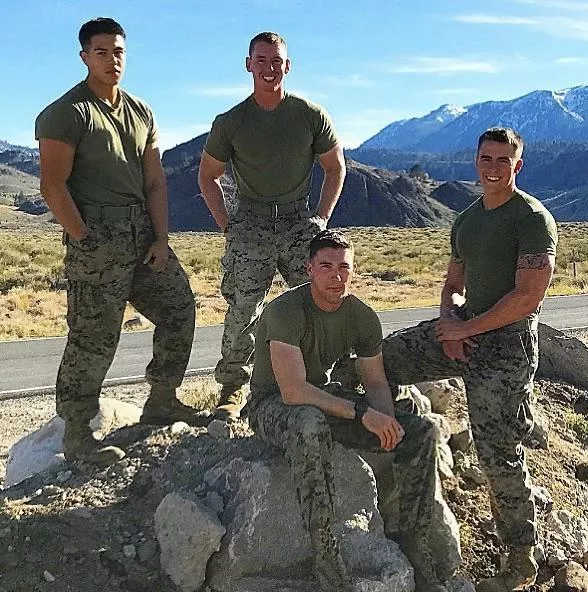 “Four Marines outdoors” …