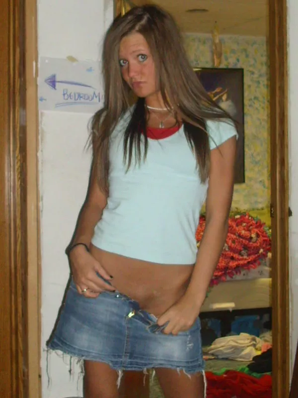 girl in jean skirt, pointing you to her bedroom