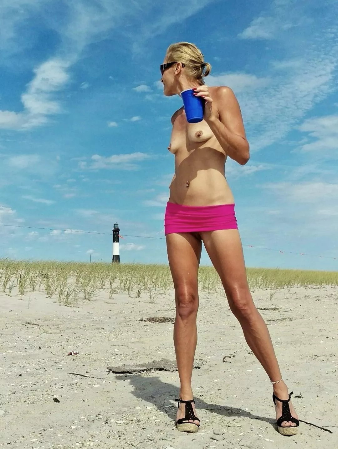 Heels..tiny skirt..drink..I â¤ the beach â›±