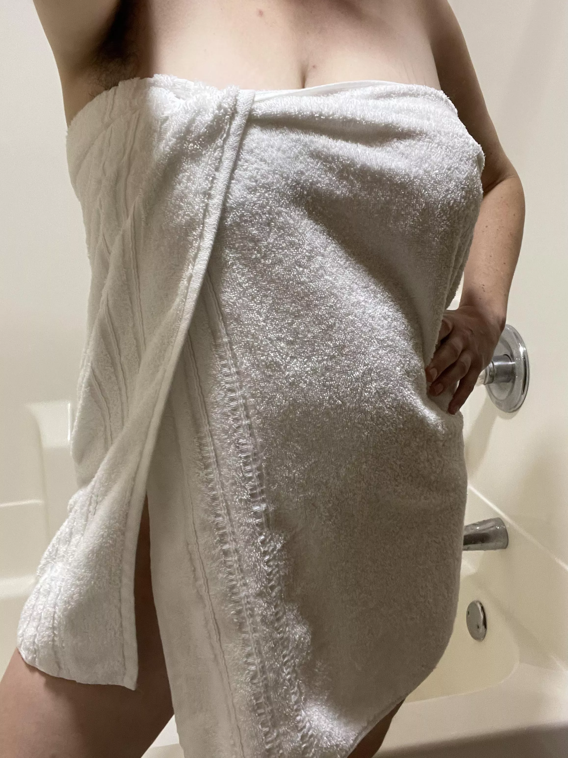 Hotel towels barely cover my hairy curves.