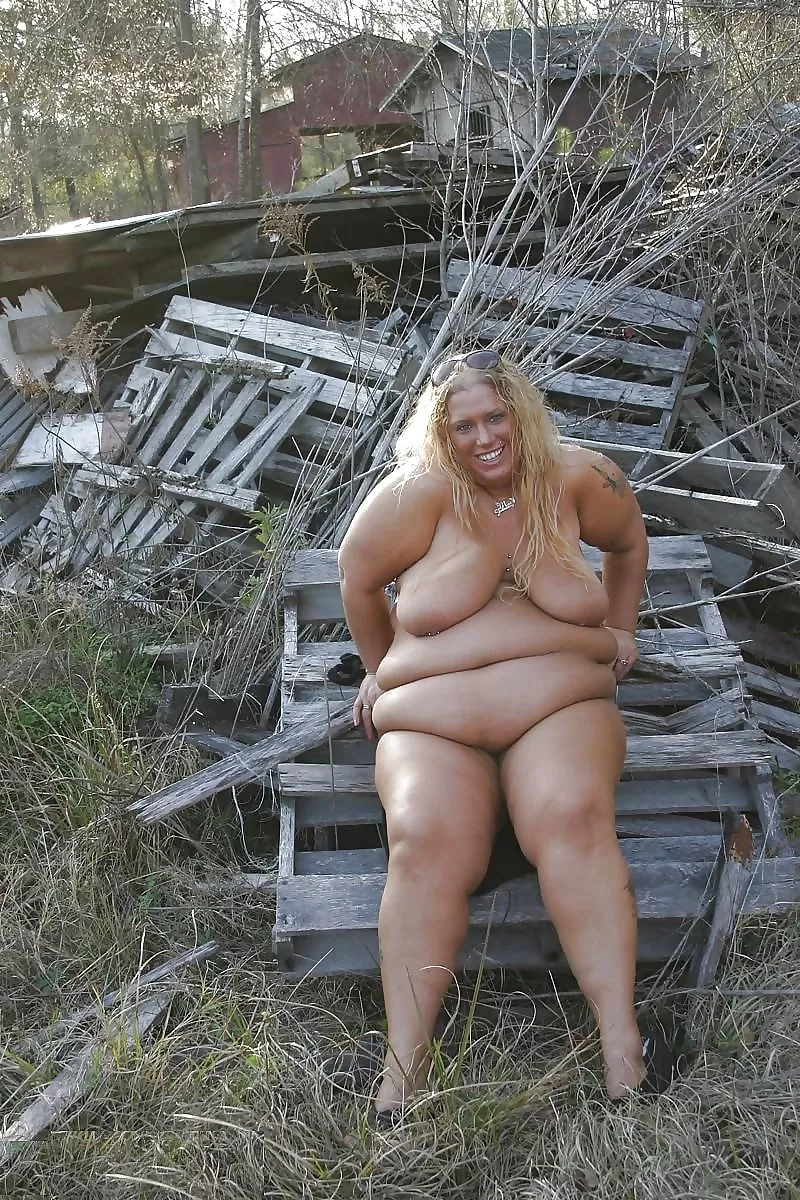 I hope this nudist doesn't get a splinter in her big tan ass