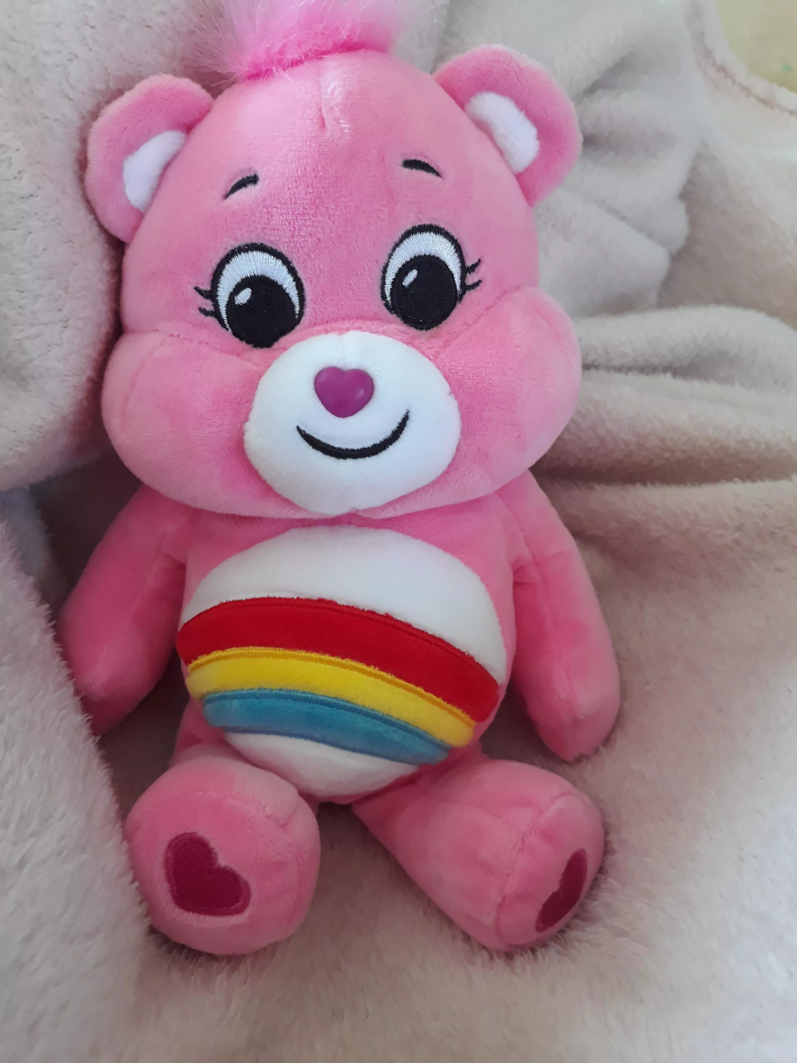 I really miss my daddy, but daddy got me a stuffie yesterday, so everytime I miss him, I'll cuddle it! It's name is Rainbow! :3