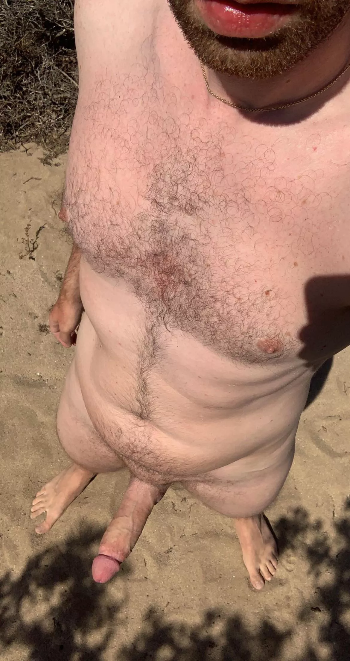 In the bushes at the nude beach. Hope someone passes by. dm for snap