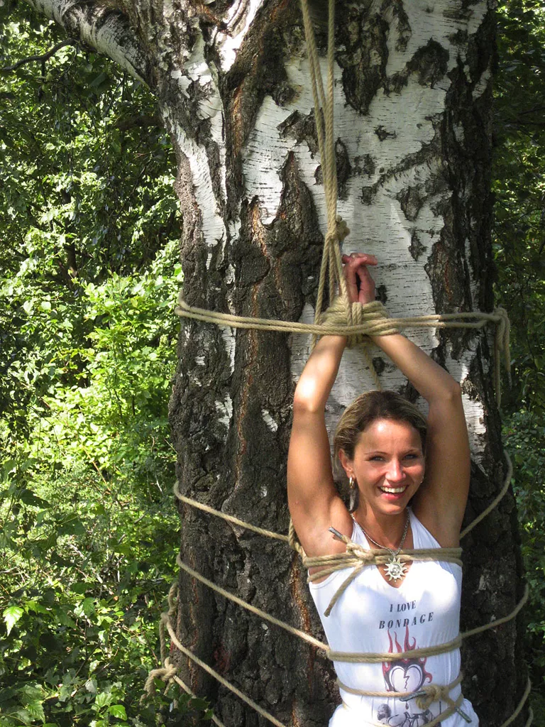 Ingrid Tied To A Tree