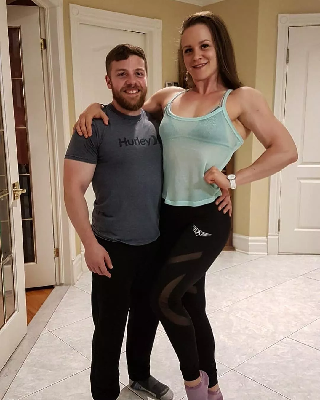 Irina Dubrovina towering over her boyfriend