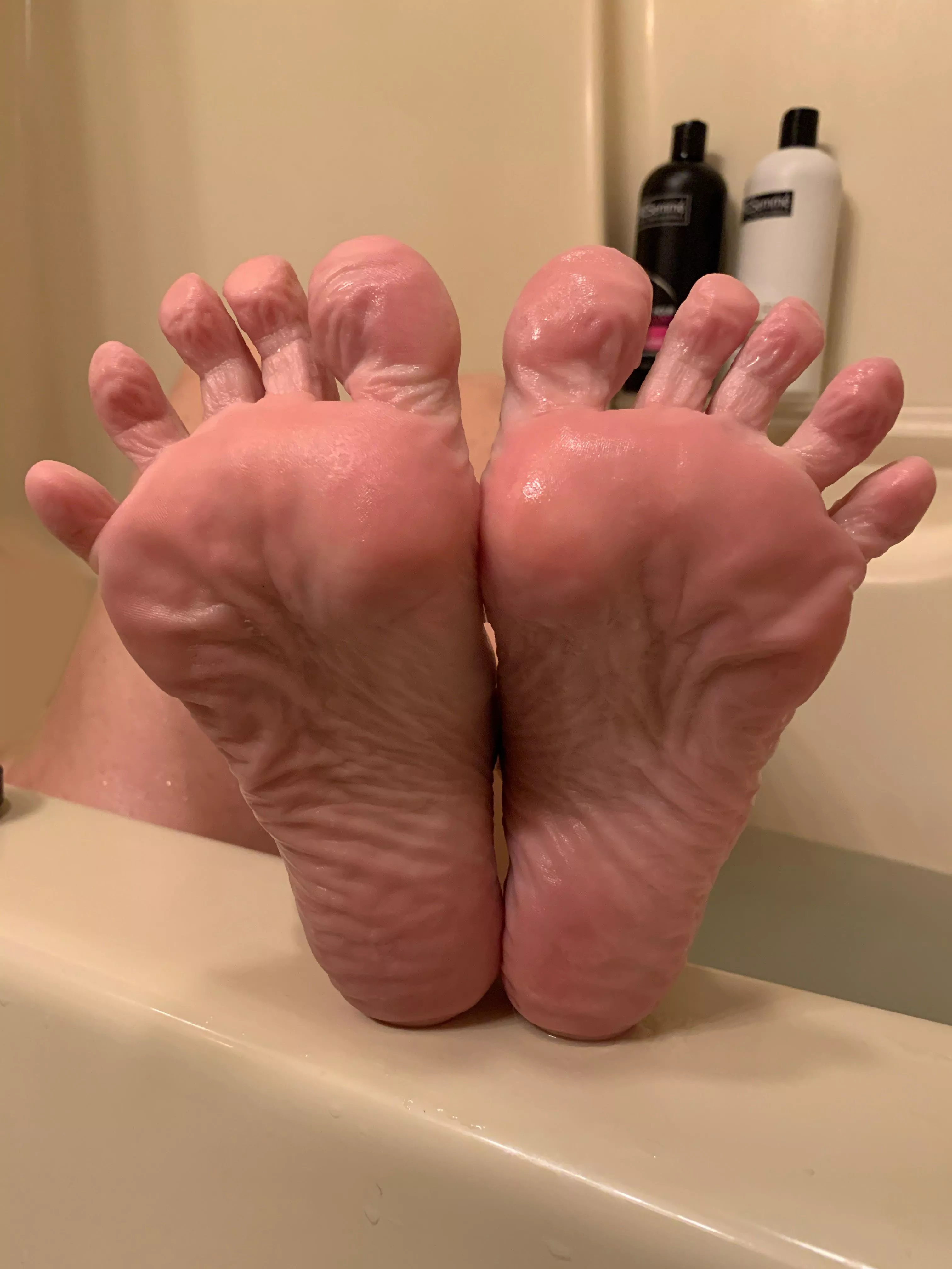 It’s 4:35 on Foot Fetish Friday and my wife is soaking in the tub before we go out tonight. I just went in there and took some sweet pics of her freshly buffed soles.