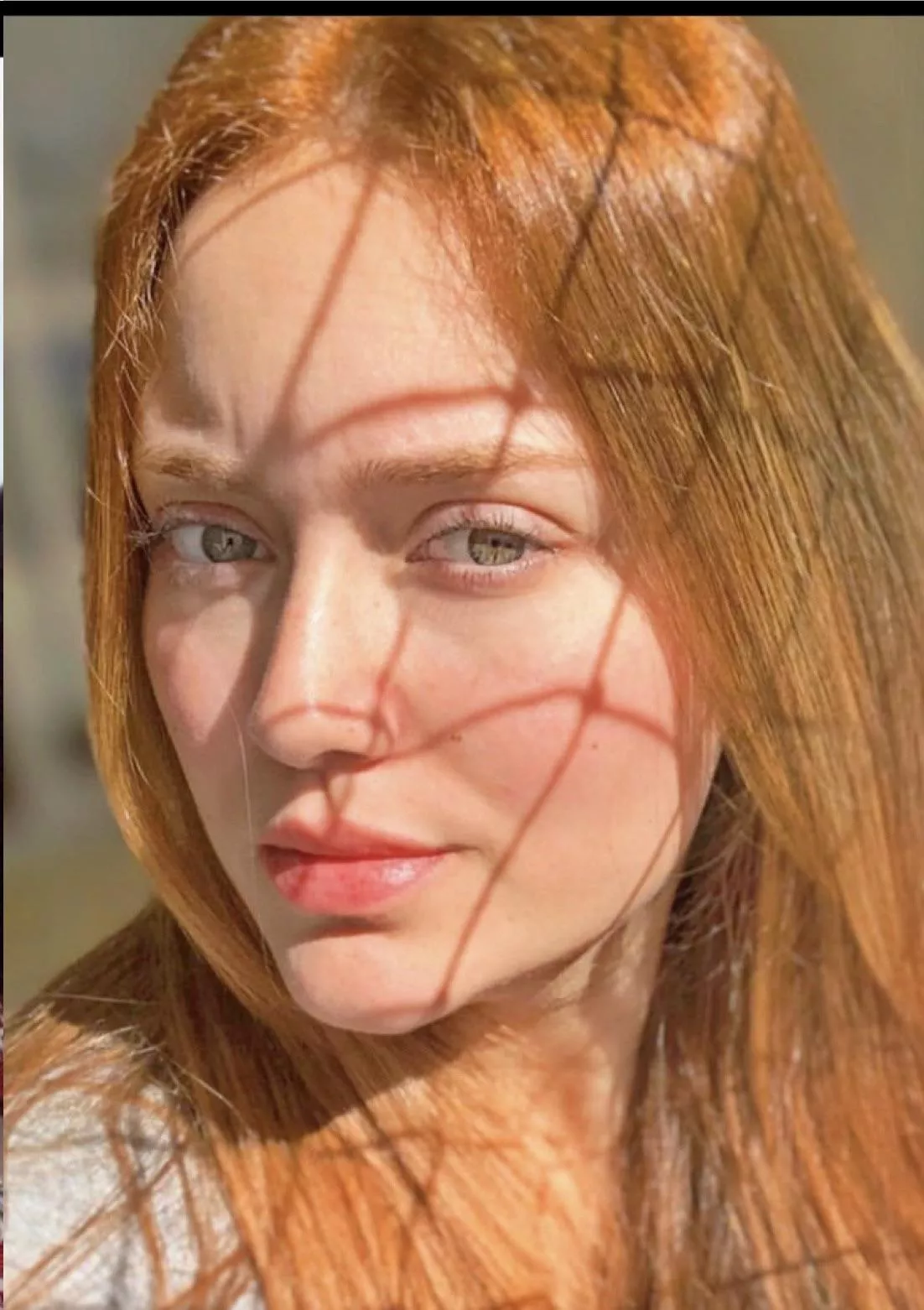 Itâ€™s a face closed up ok? Brazilian, redhead and green eyes. Any comment?