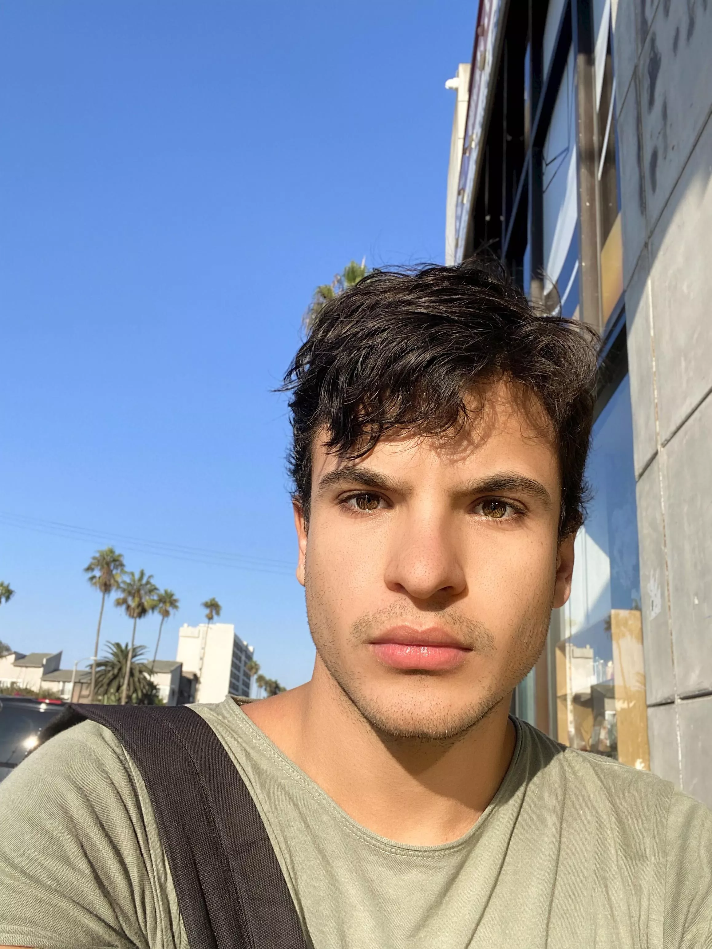 It’s late October but still warm in LA. Post beach selfie with messy hair 🌴🌞