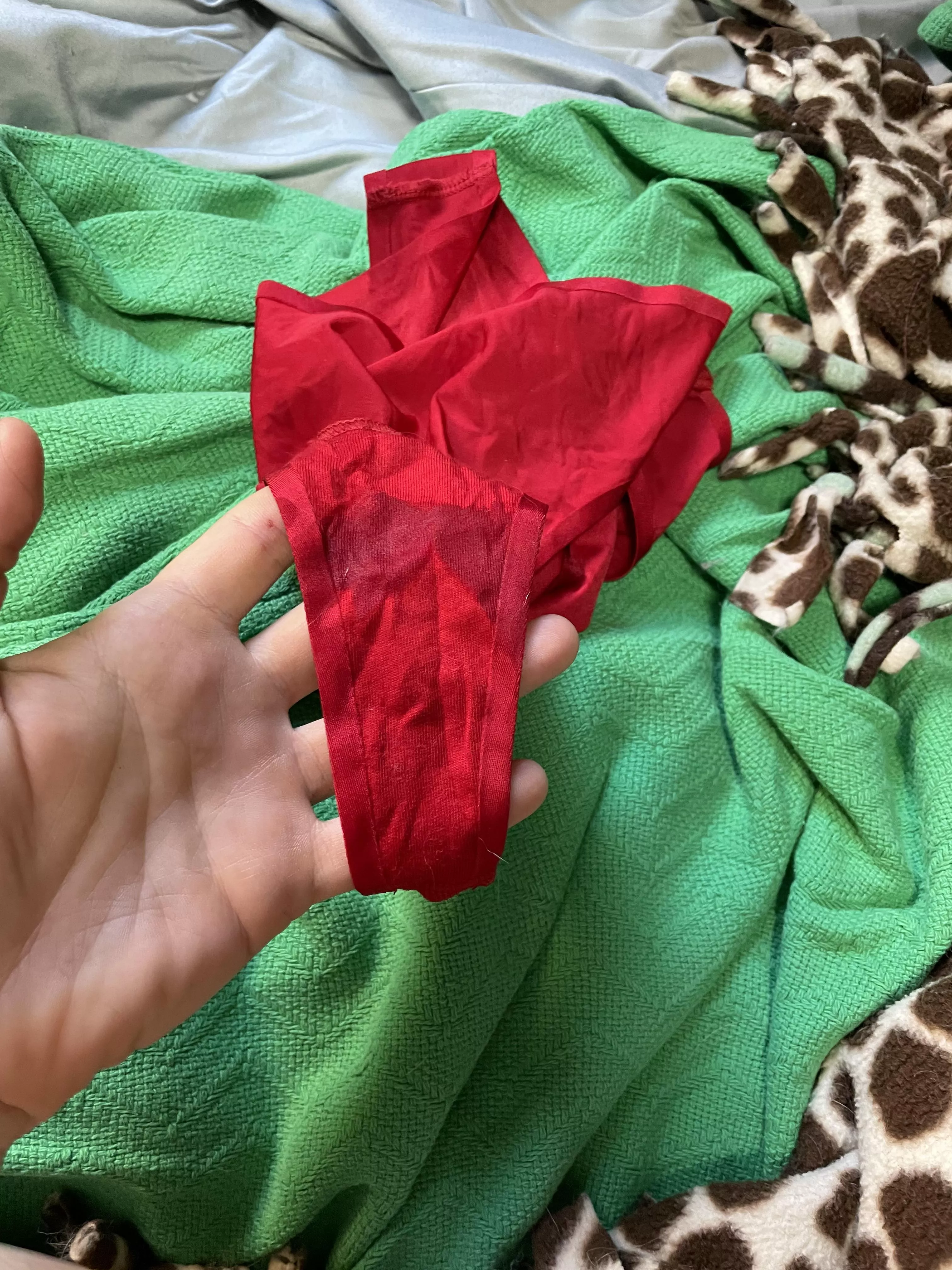 Just started this red satin thong… Let me know what I should do to it 😘