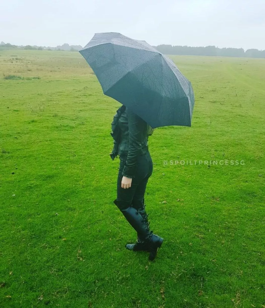 Leather jacket, leather boots in the rain.