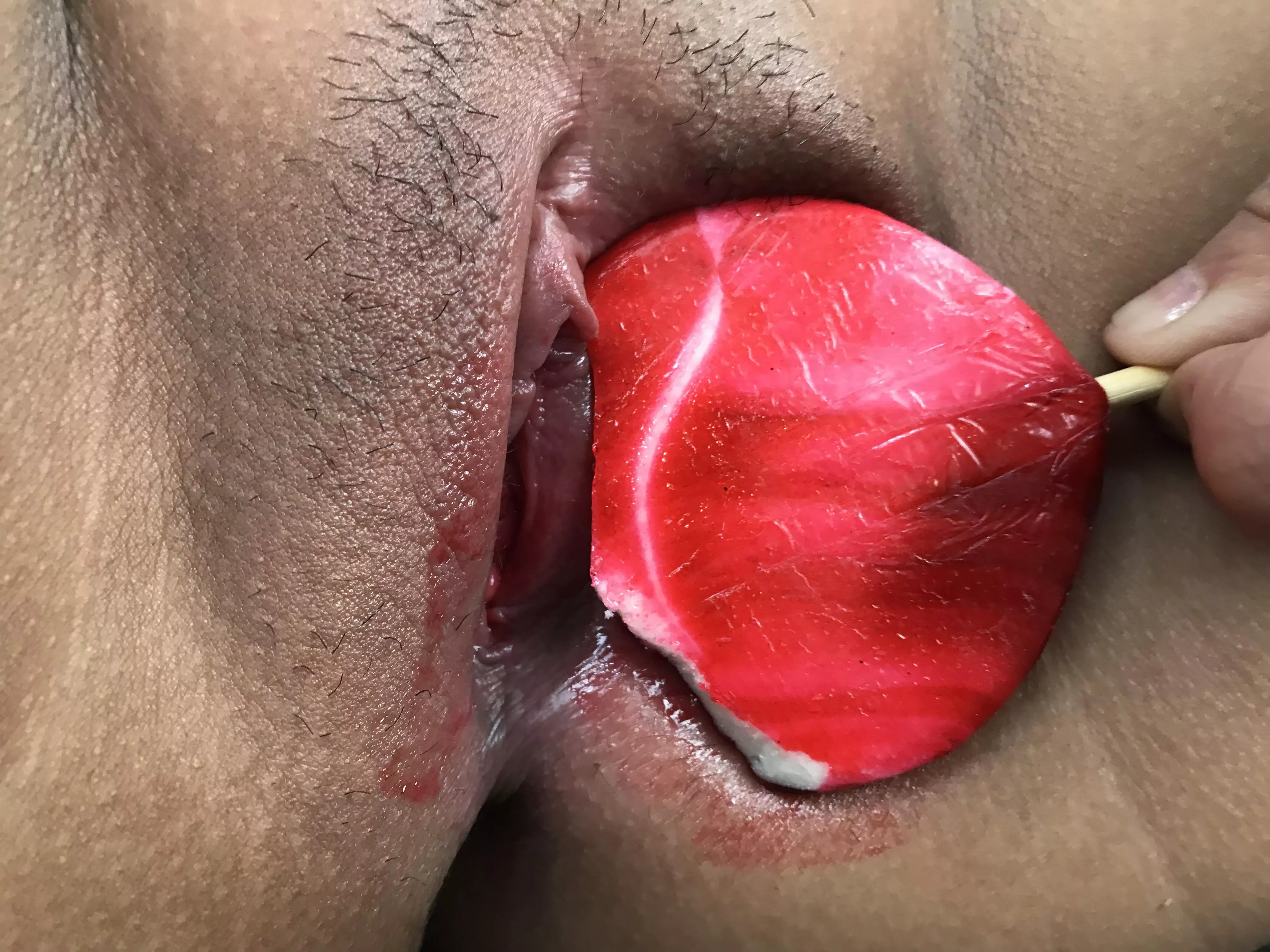 Looks like my pussy took a big bite of my red lollipop, heheâ€¦!