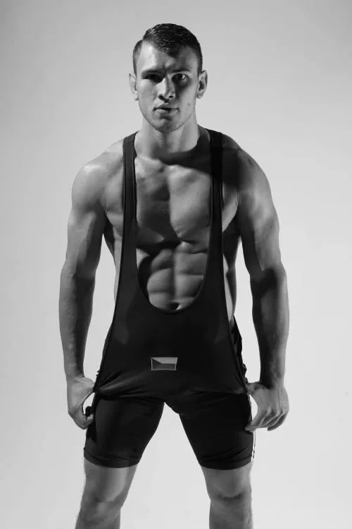 “Low cut singlet in black and white” …