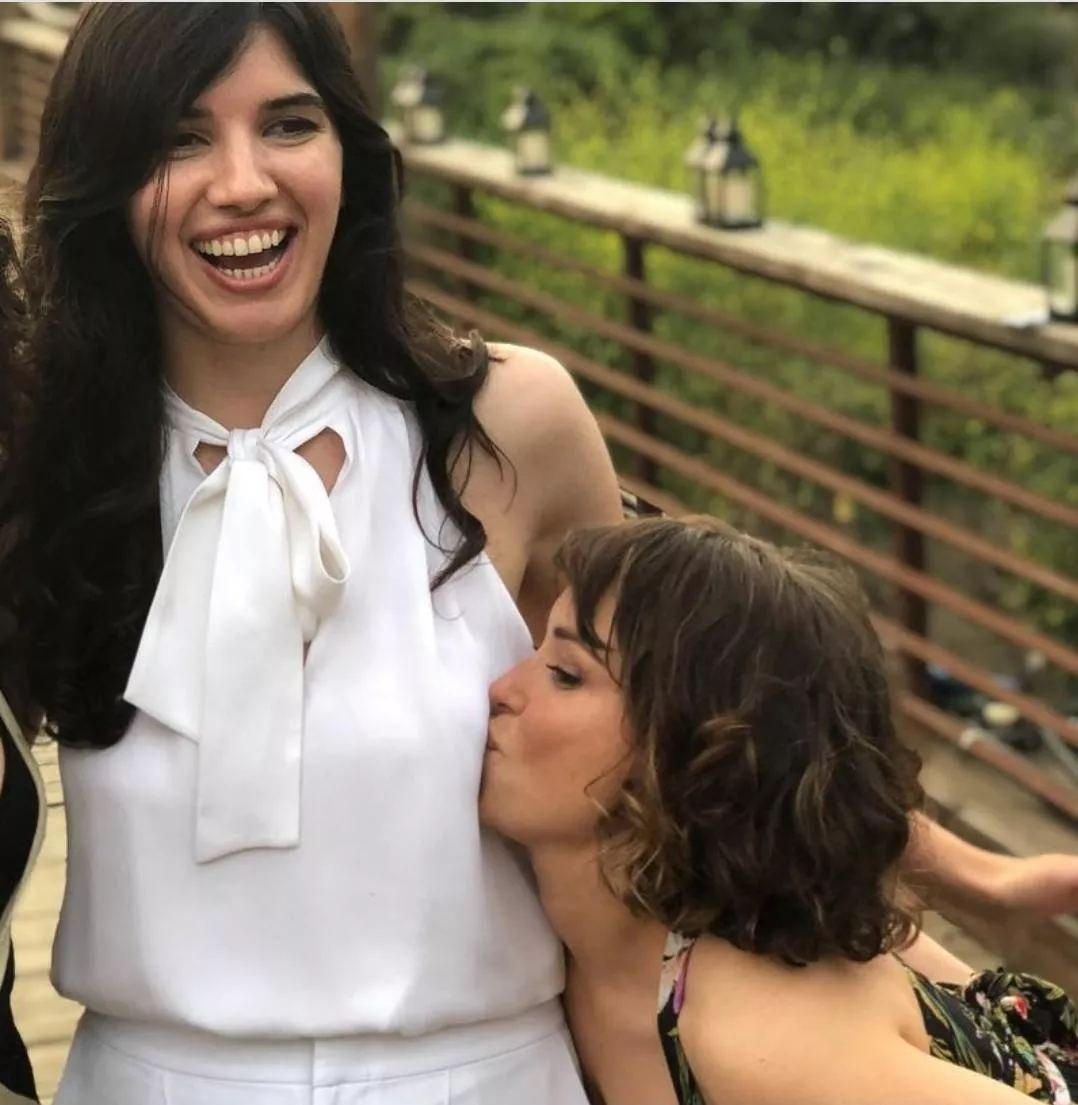 Milana Vayntrub showing her friend a little affection.