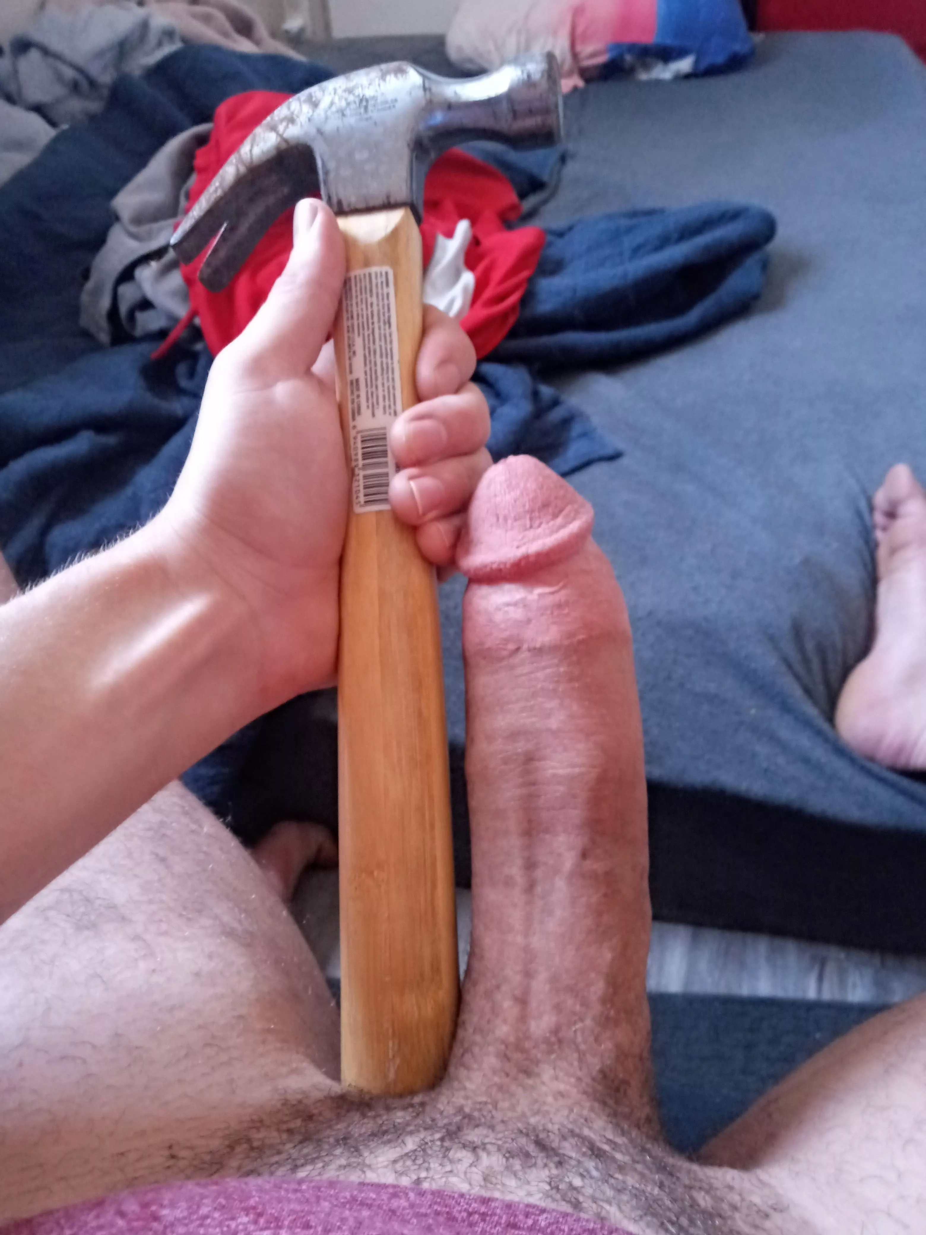 My cock beside a hammer