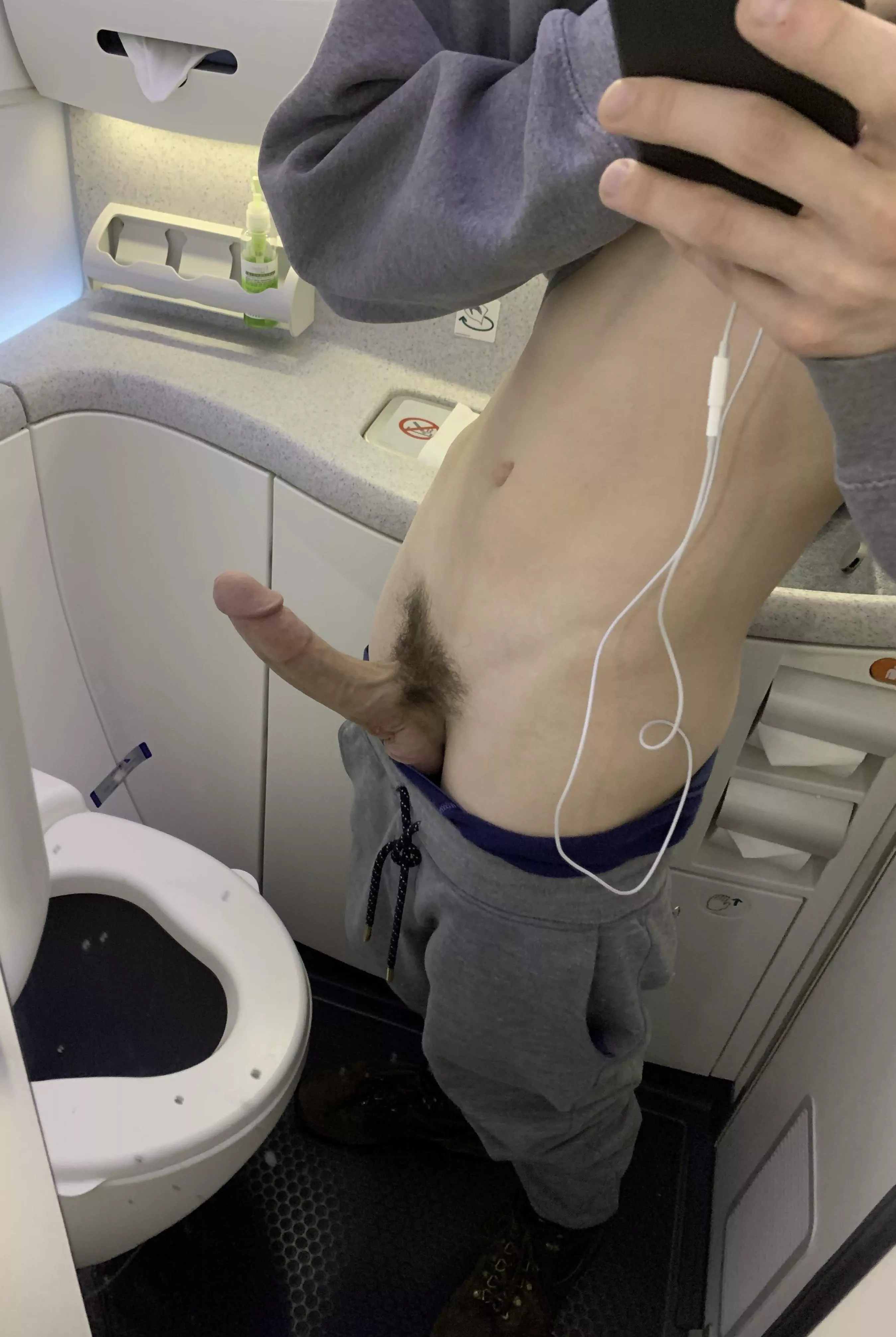 My dick was spilling out my pants on the flight. I just had to run to the bathroom and take some pictures.