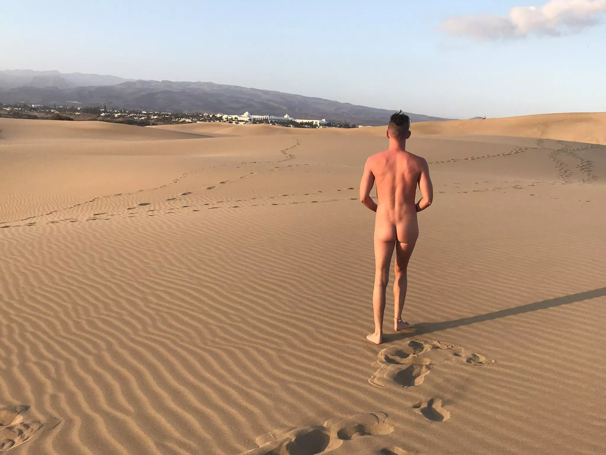 My long term boyfriend heading to the sand dunes in Maspalomas. He proved popular. 🍑