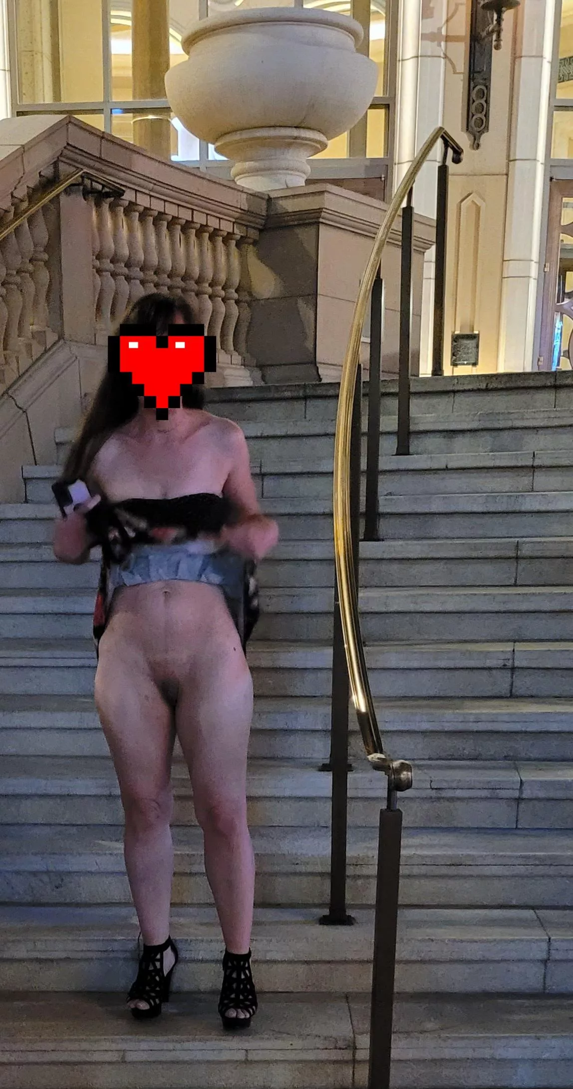 My wife (44) was trying to get some attention in Vegas! What would you do if you saw this walking by? Would you invite her back to your suite?