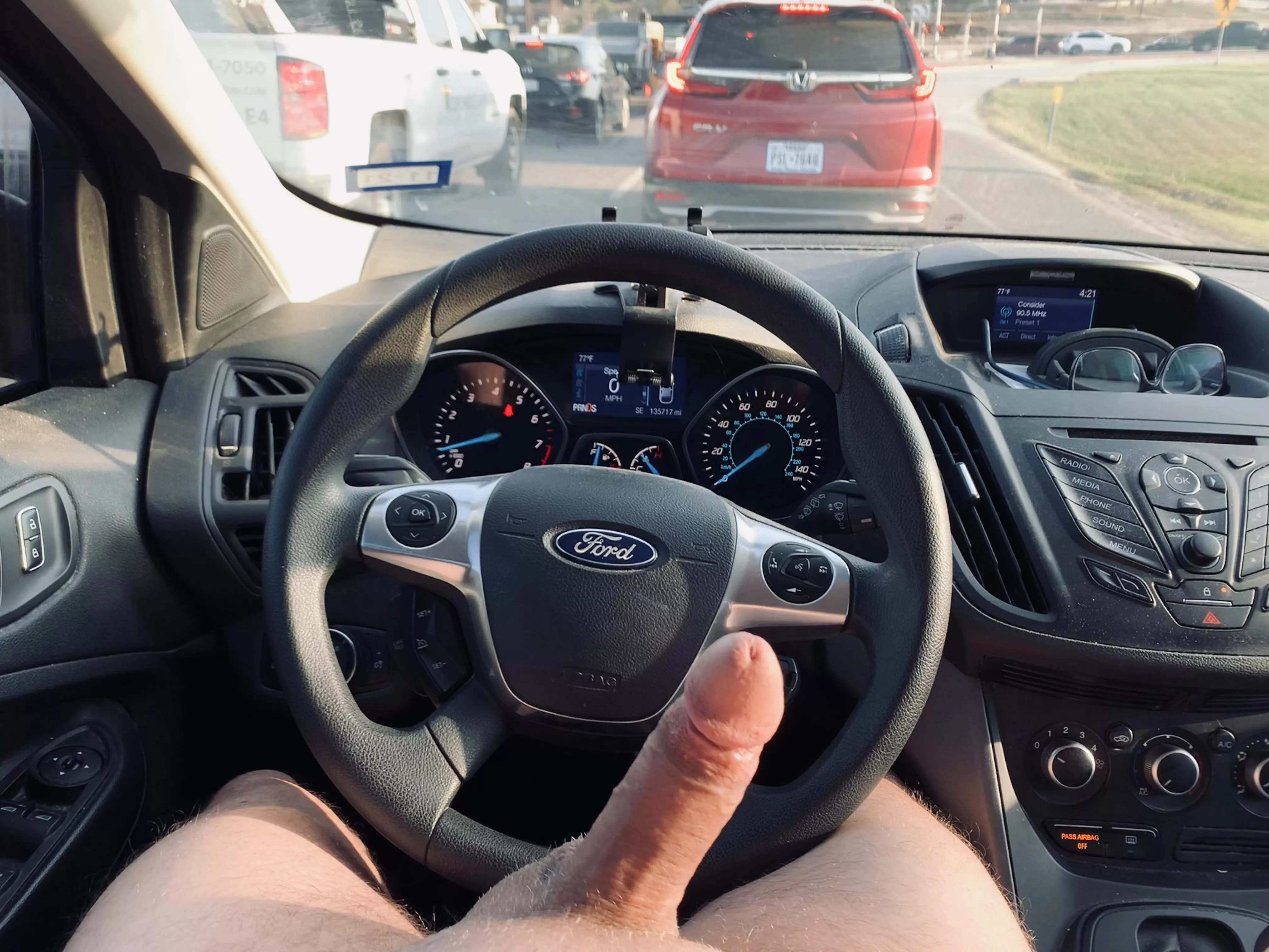 Naked driving in rush hour traffic