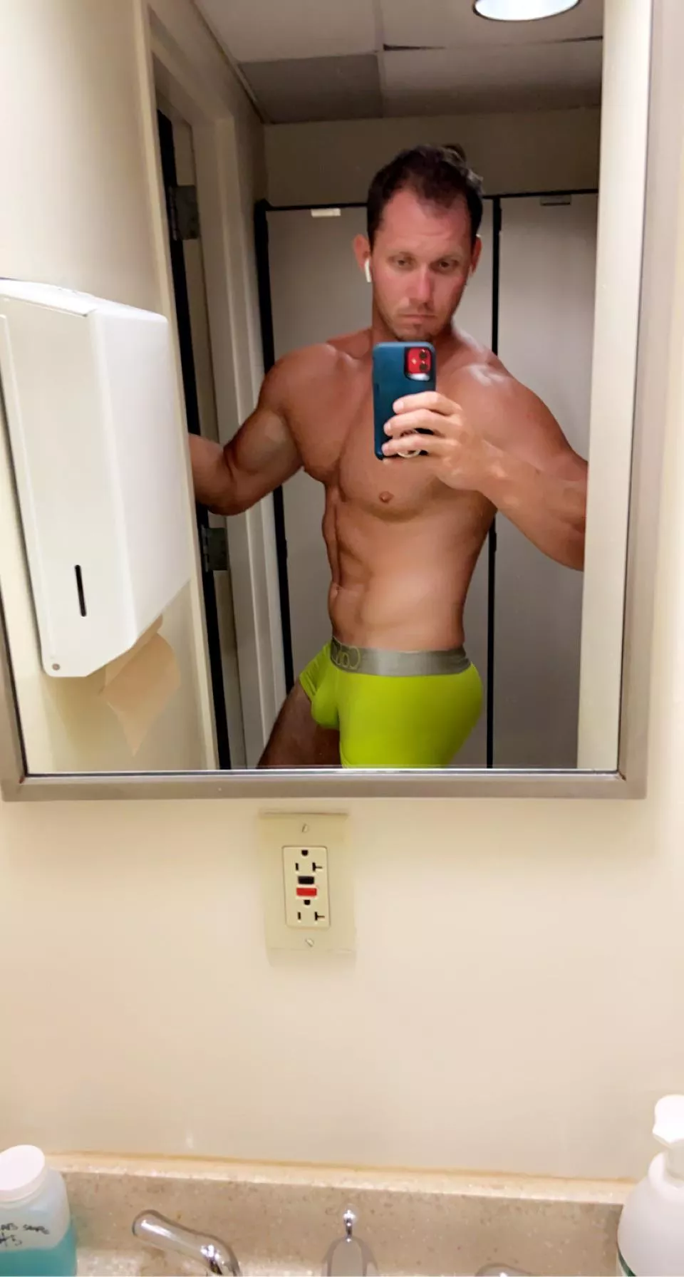 Neon green calvins in the locker room post lift ðŸ˜ˆ