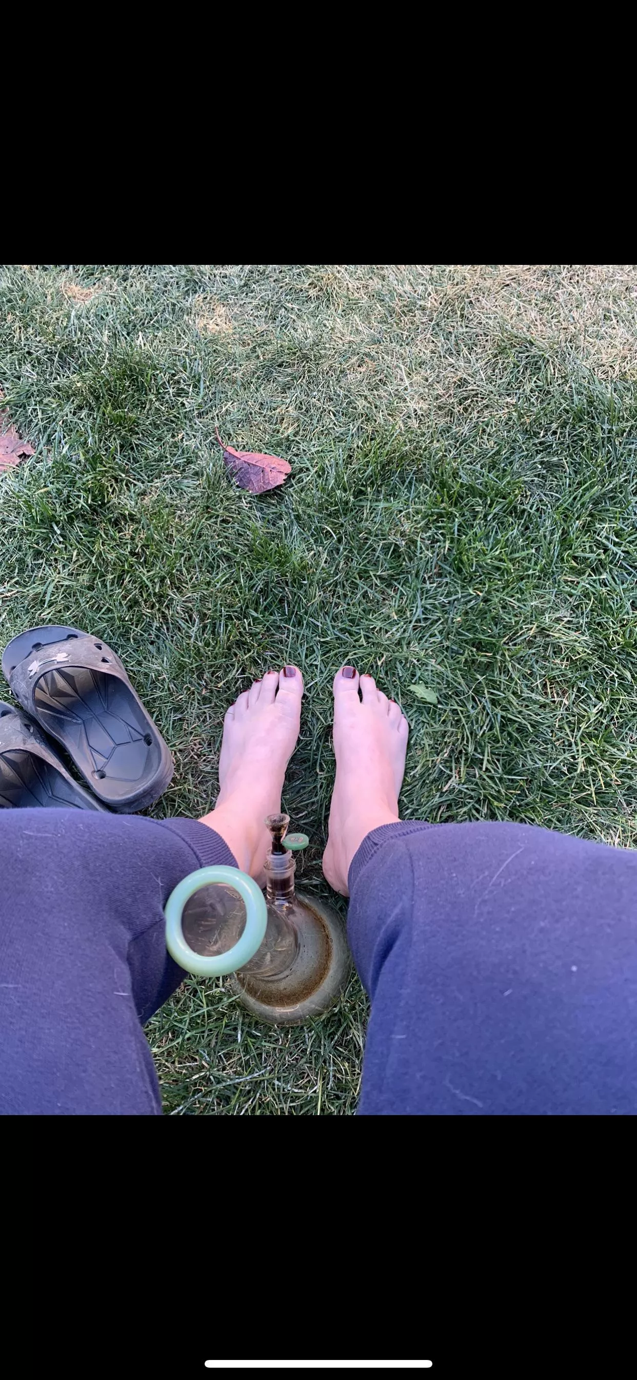 New pedicure outside in the grass. Iâ€™m happy.