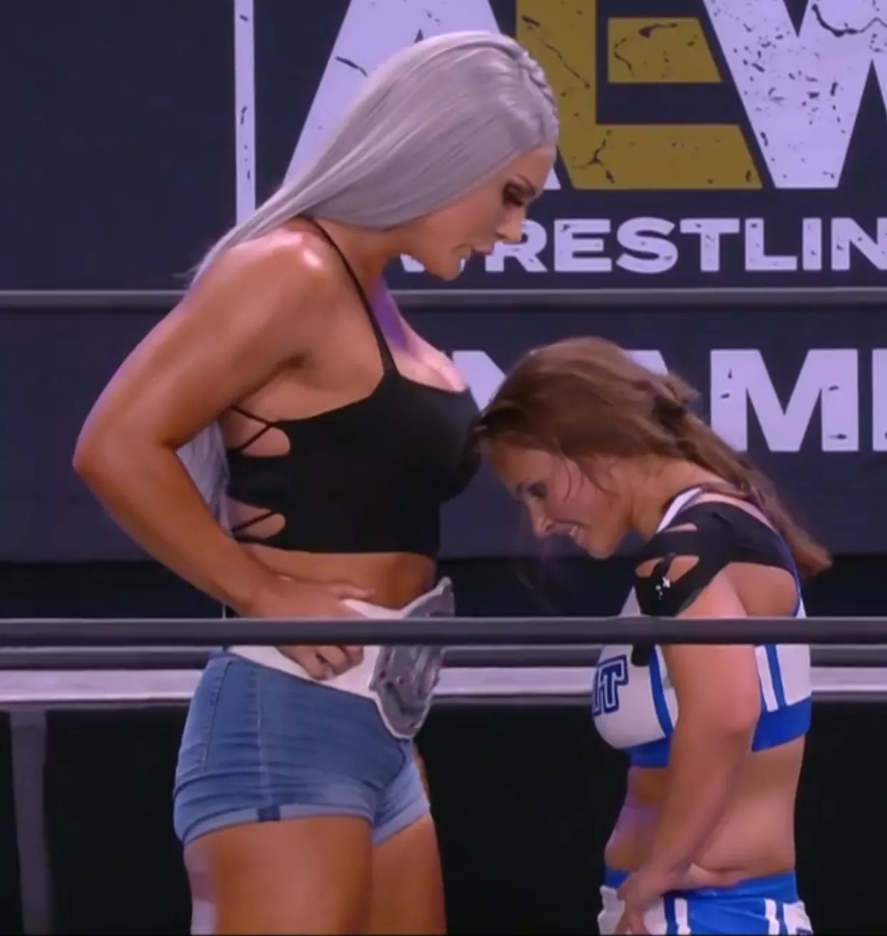 NWA Wome's Champion Kamille stands face to face...er...chest to face with her next challenger, Layla Hirsch.