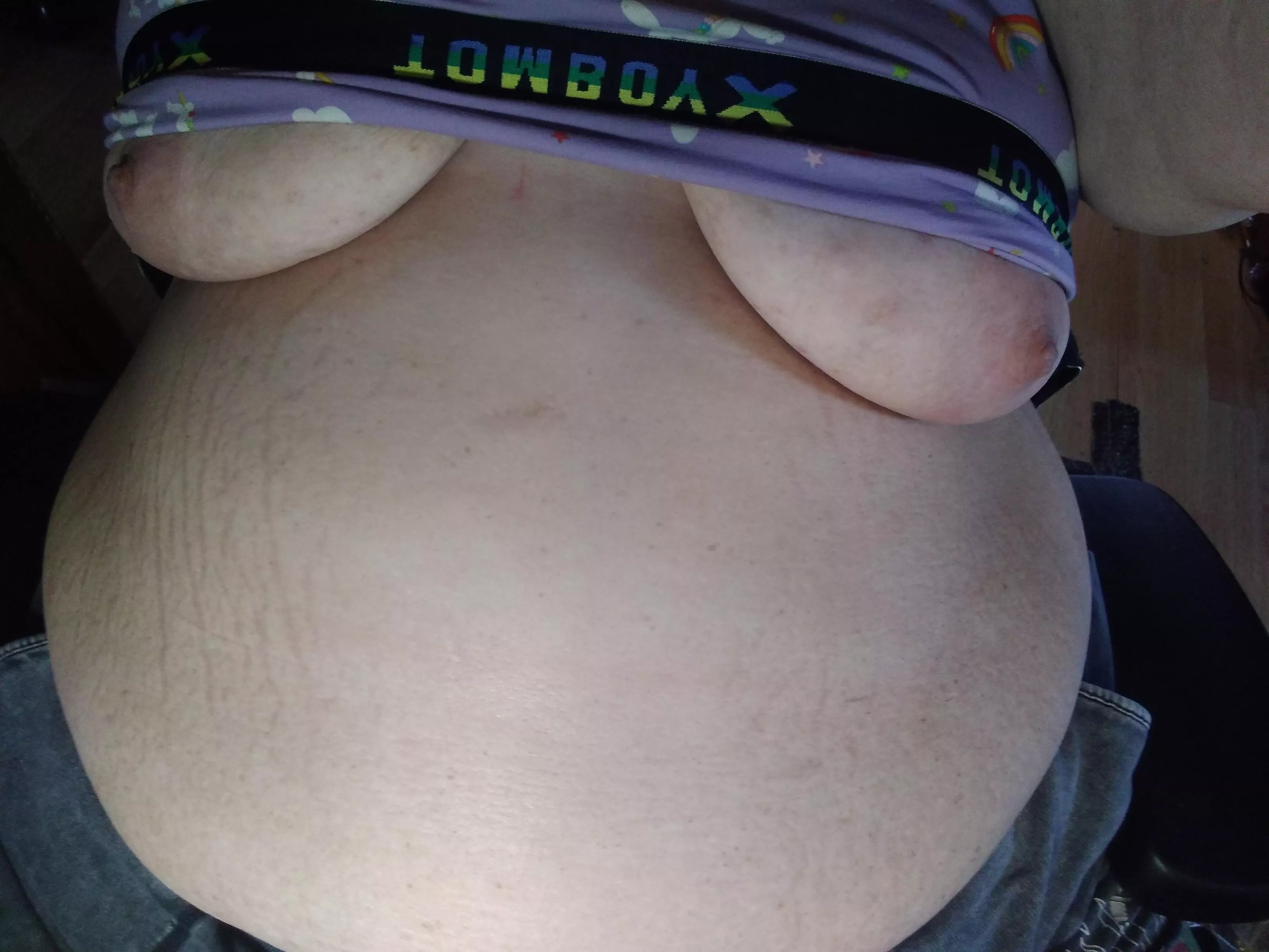 Peekaboo titties and lots of belly