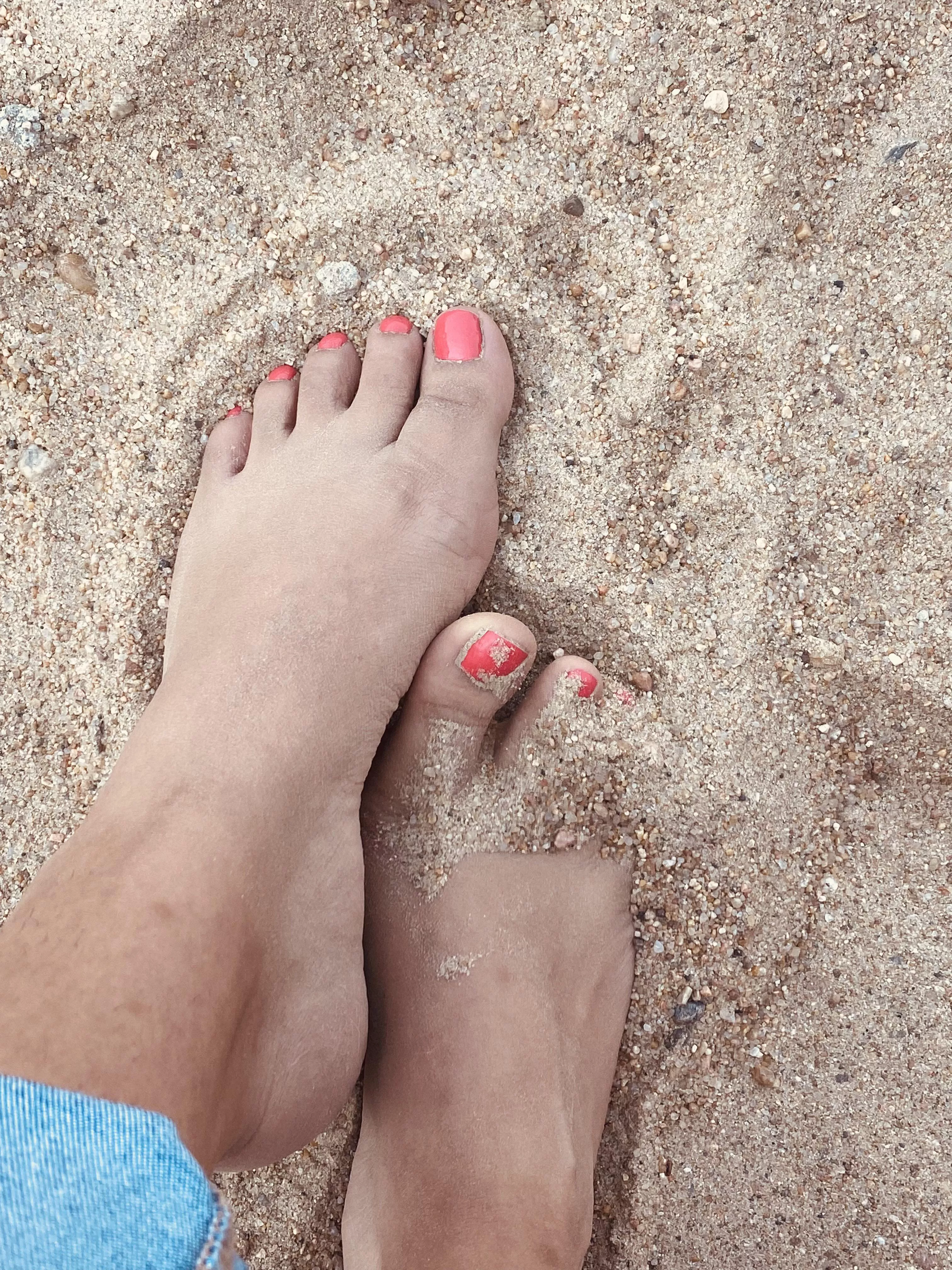 Playing in the sand. Will you help wash them?