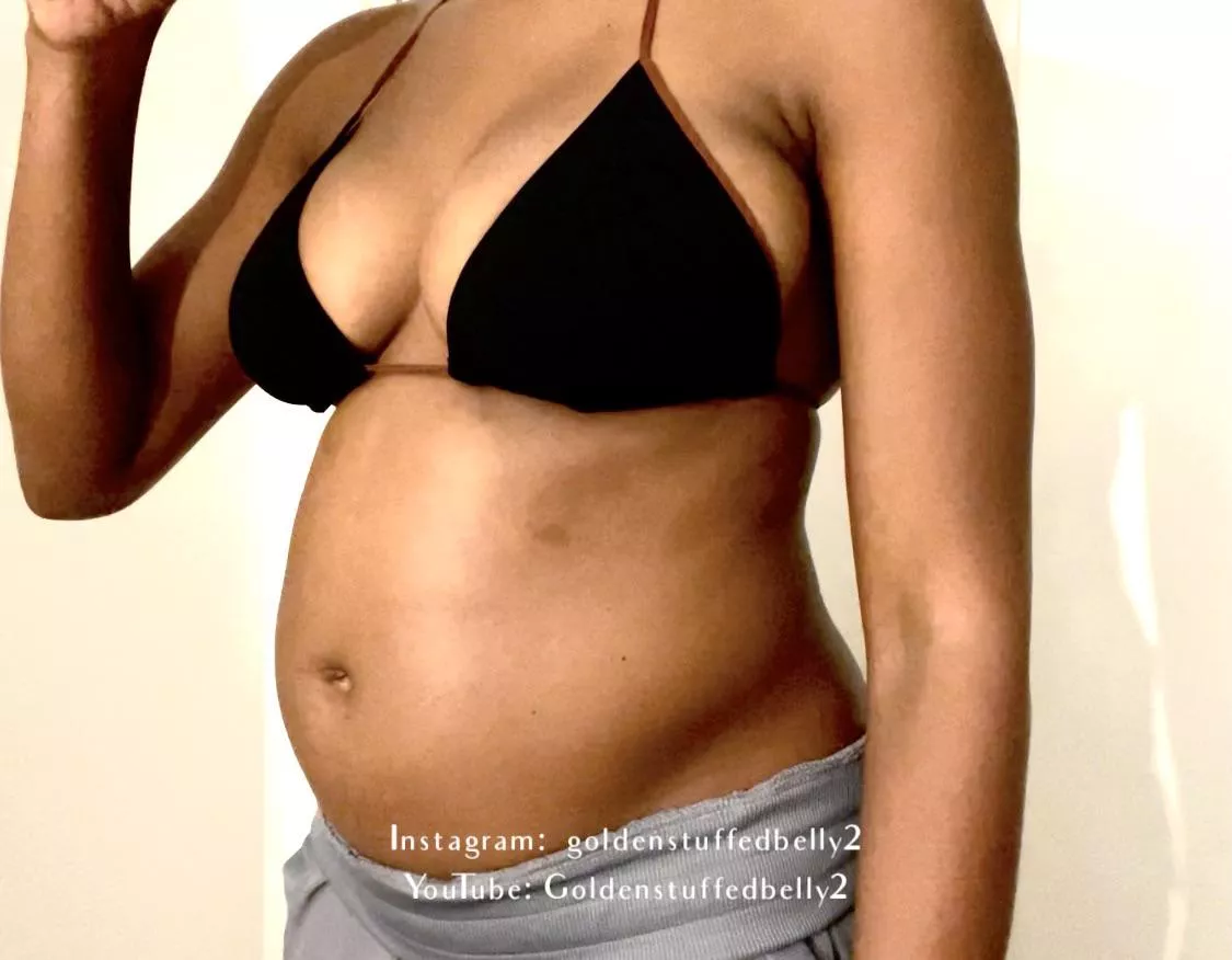 Plump belly in bikini top. What do you think?