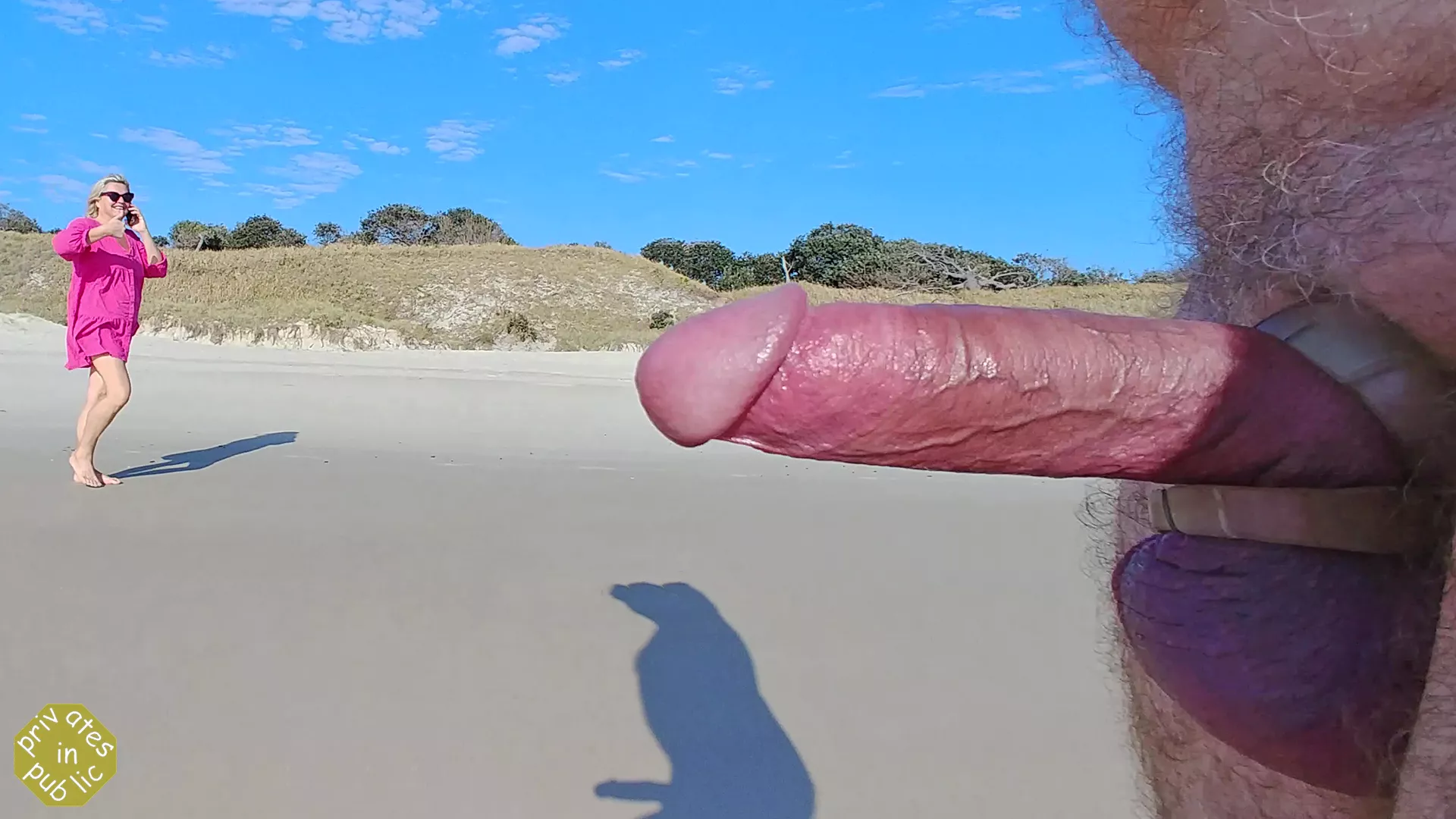 Public erection boner on the beach gets an appreciative 