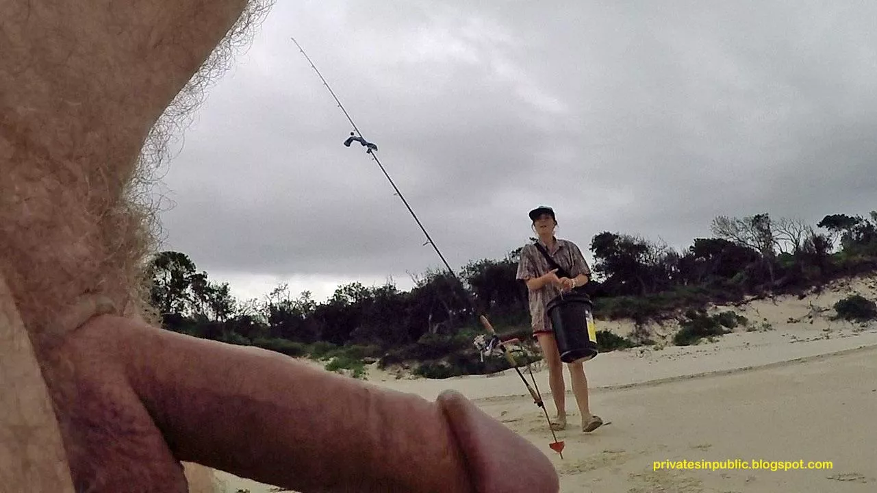 Public erection CFNM on the beach - female angler takes the bait!