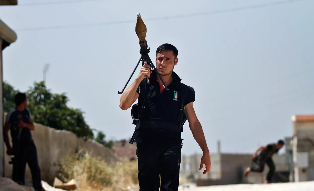 Ridiculously Photogenic Syrian Rebel Fighter posted by bk553 in r/pics. 