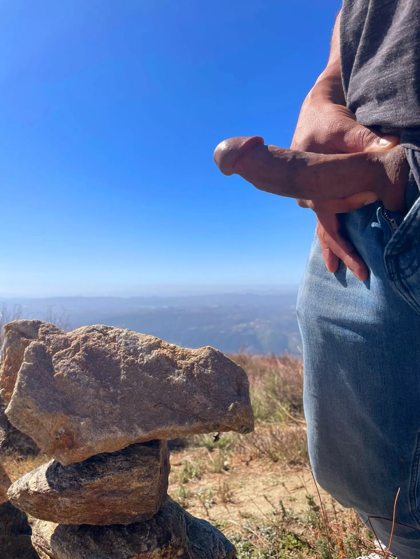 Rock stacking and cock flashing in a National Park.