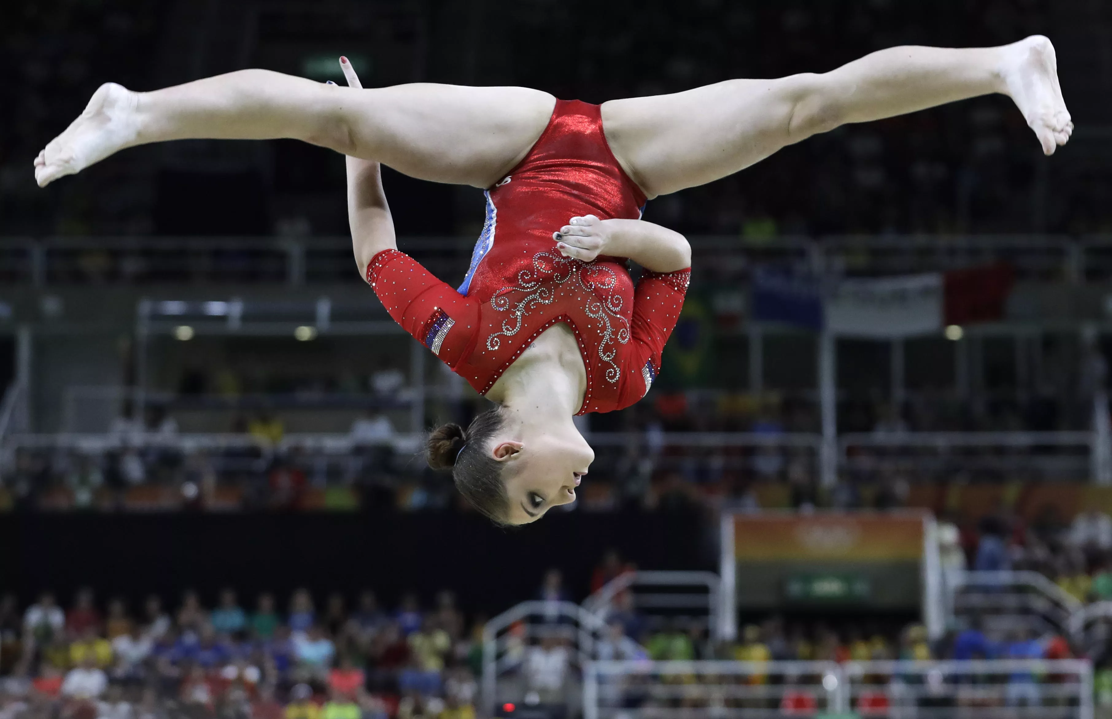 Russian artistic gymnast Aliya Mustafina doing the splits