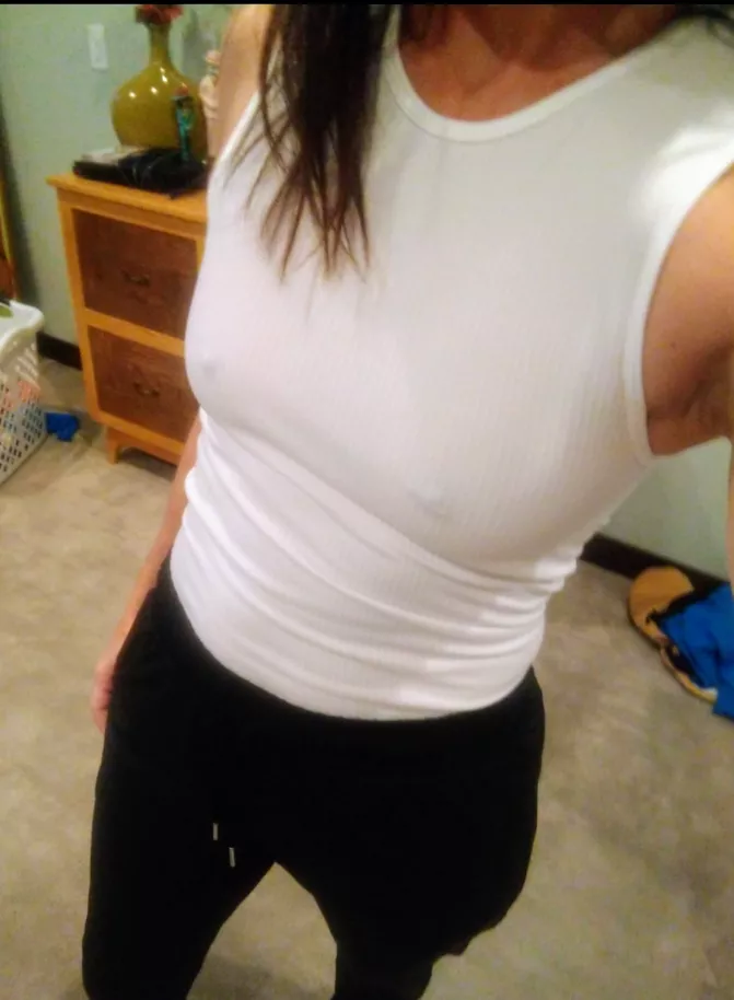 Same hotwife, subtlety different. White tank and no bra is my fave!