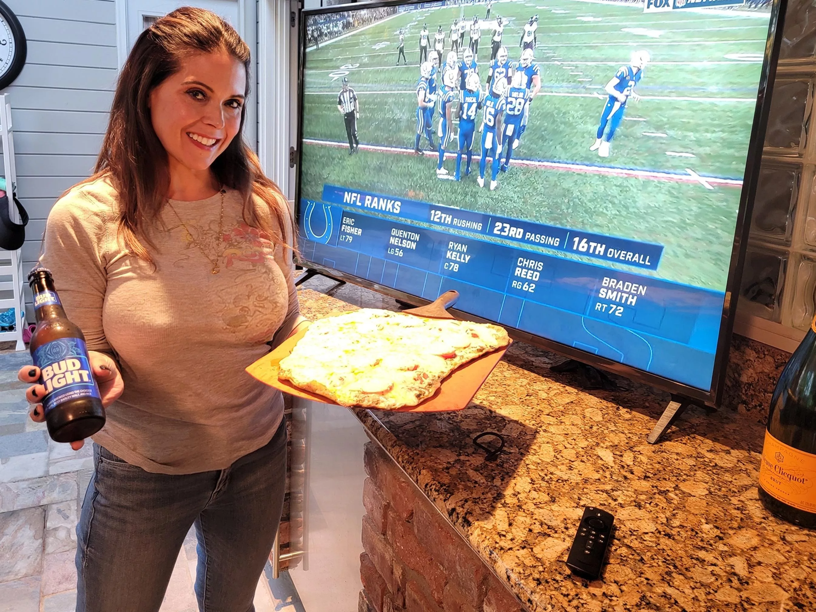 She brings me BBQ pizza and beer, says it's the least she can do since she needs the sex from other men. Win-win, I say