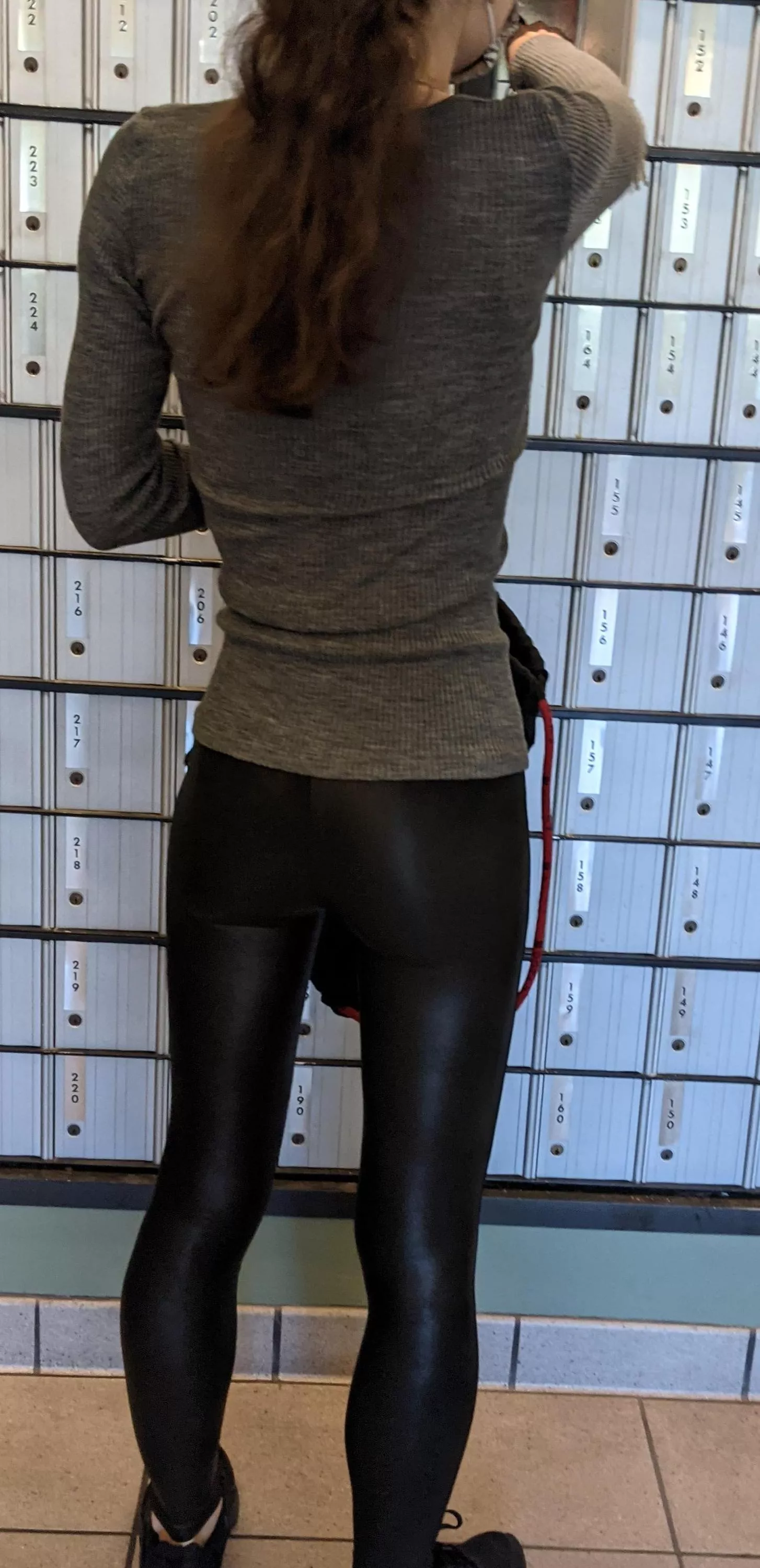 Shiny Yoga pants at the post office