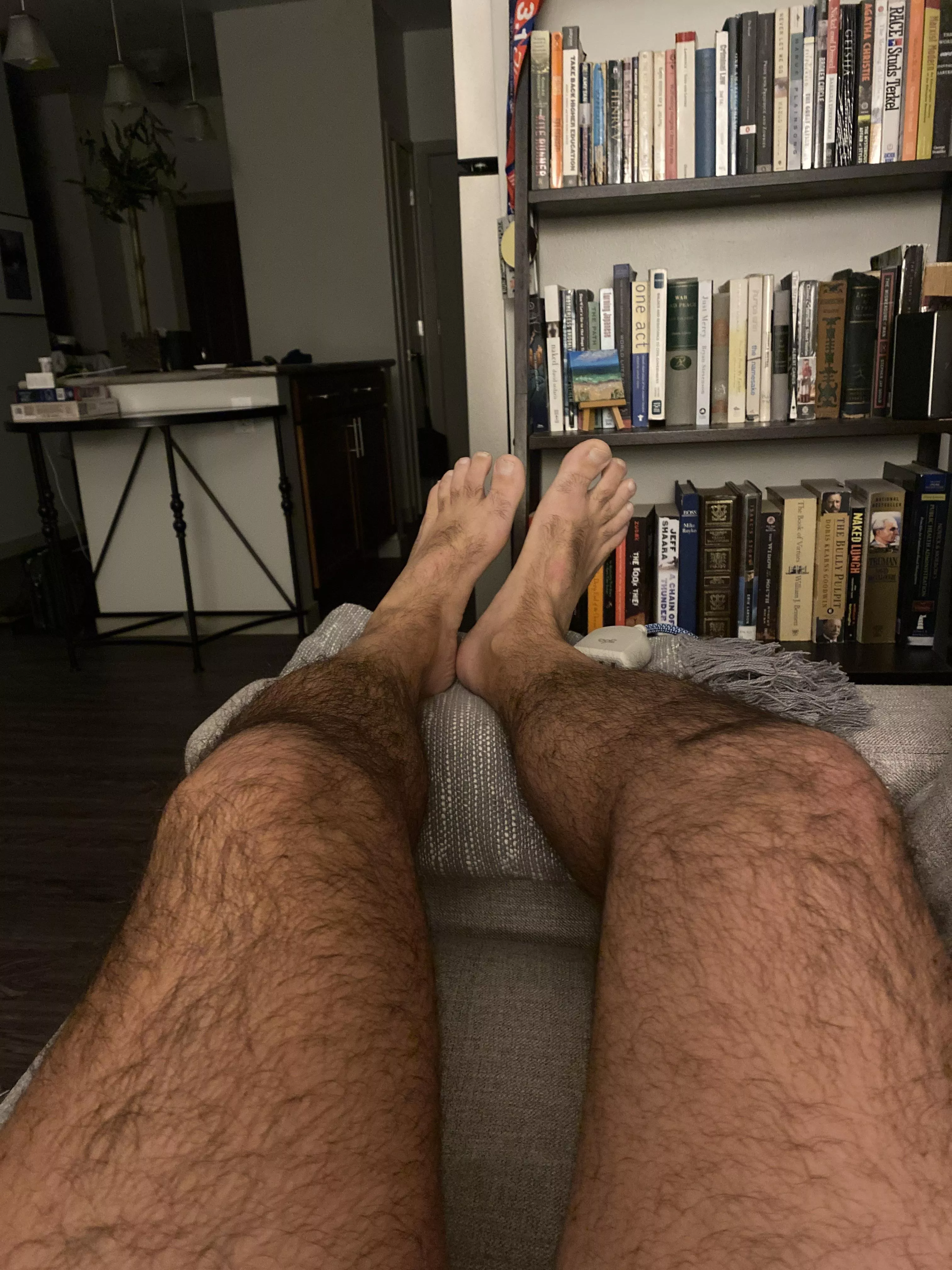 Size 10, hairy feet. Sore after running and playing tennis