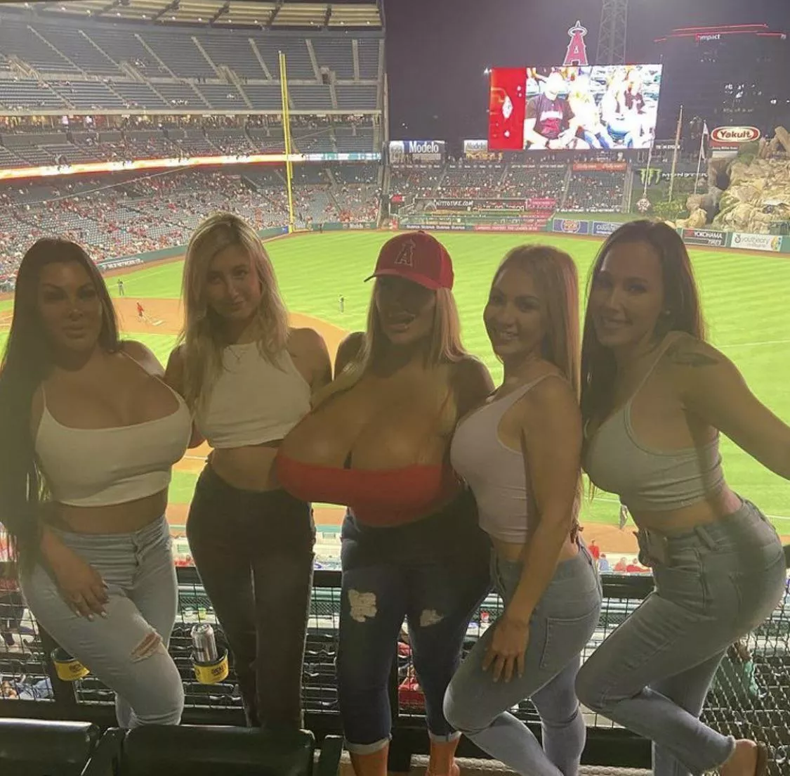 Some bimbos at a baseball game