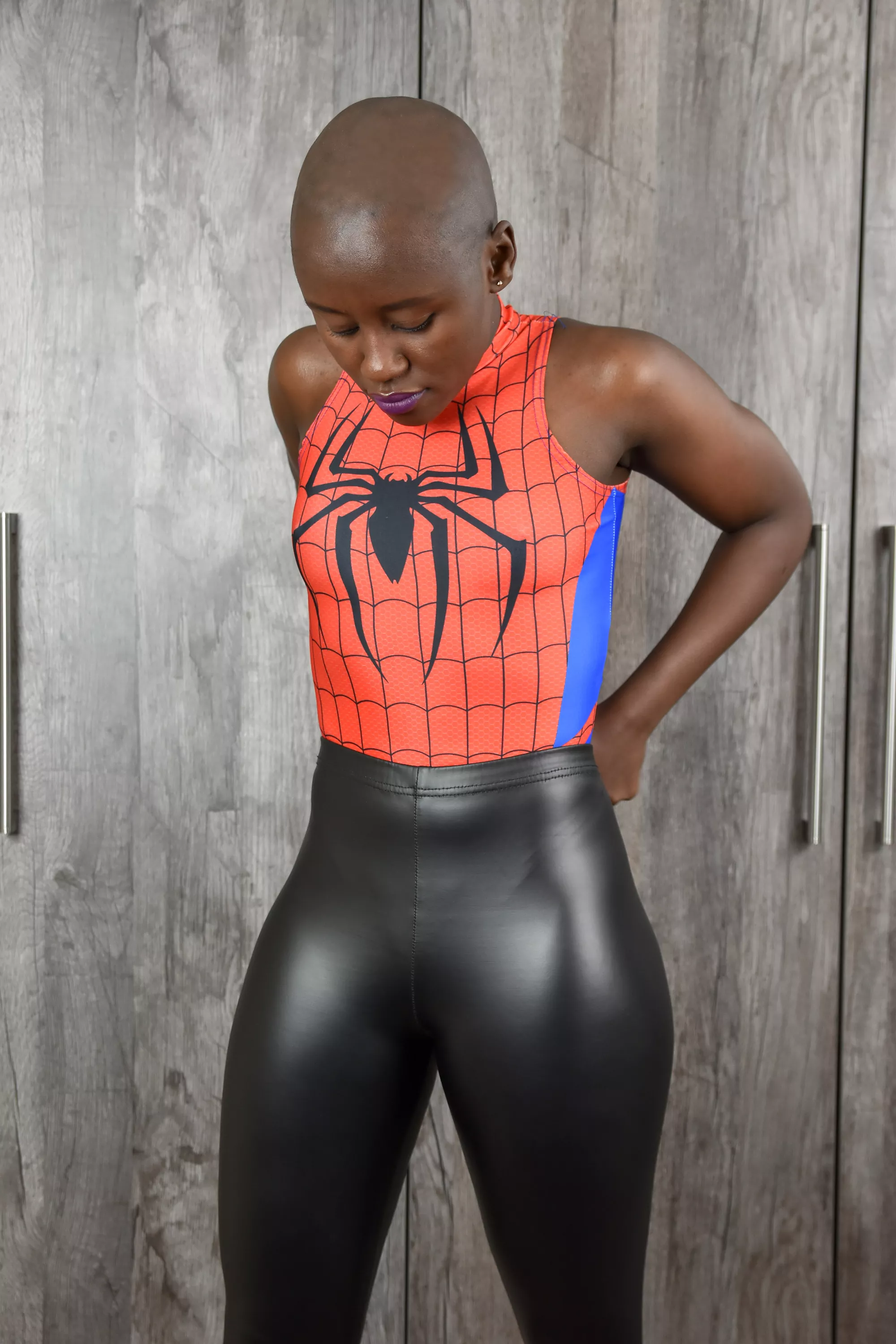 spider girl in leather leggings